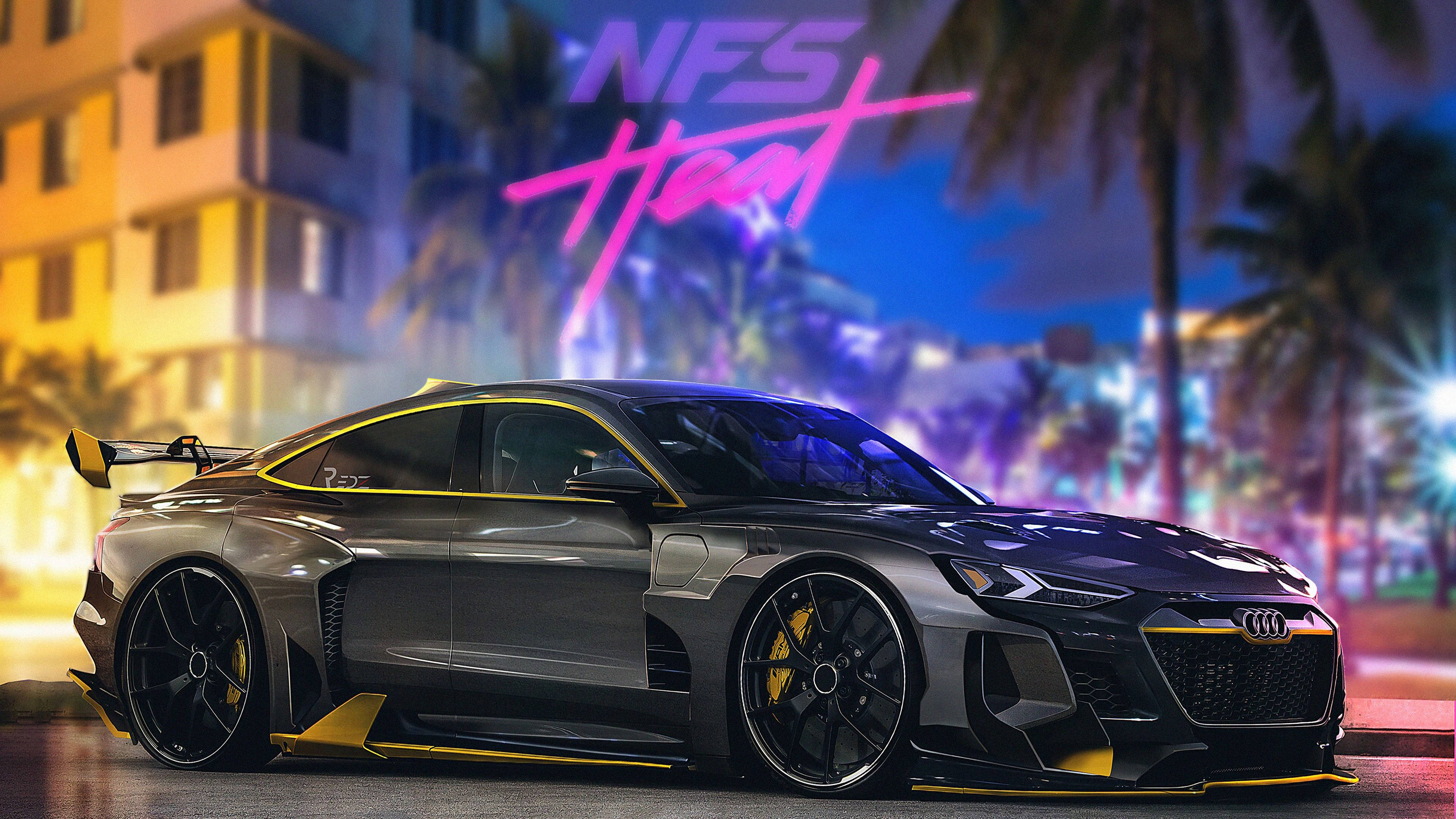 《Need for Speed Heat》黑色奧迪 壁紙 — 一輛時尚的黑色奧迪跑車，帶有黃色點綴，停在夜間霓虹燈閃爍的邁阿密街道上，下方是發光的NFS Heat標誌。
