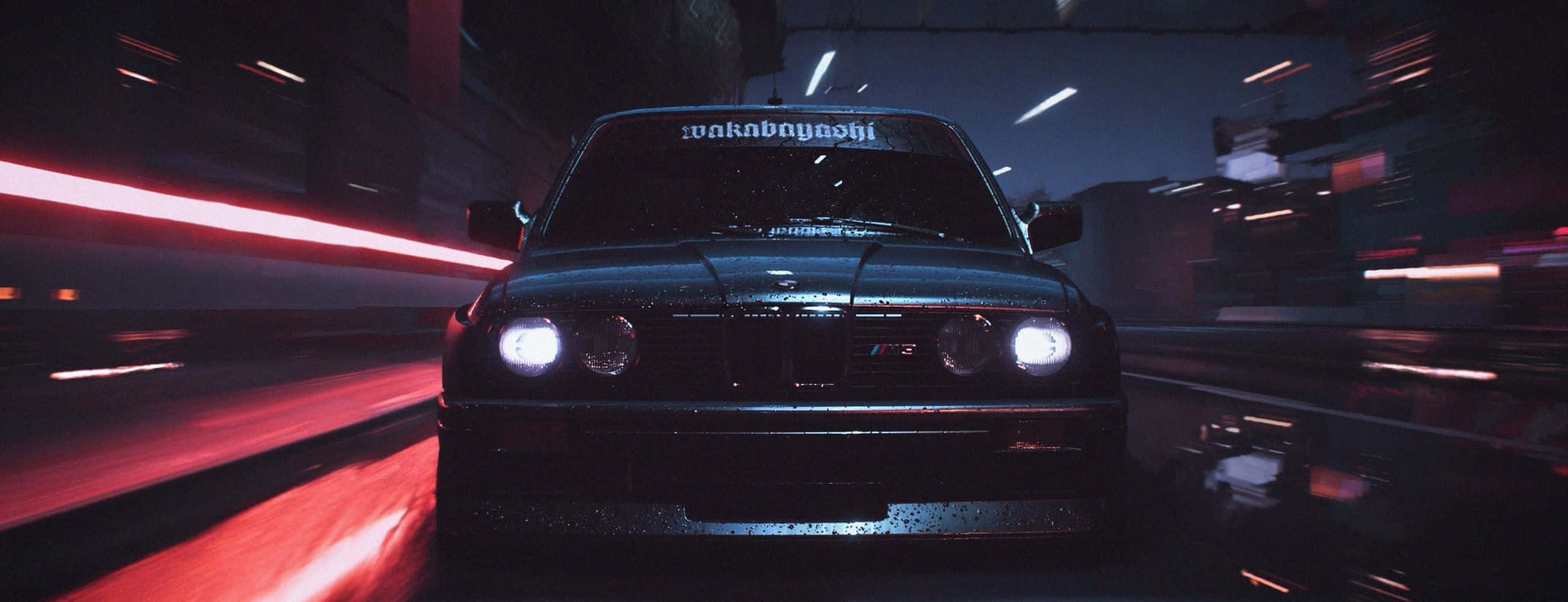 《Need for Speed Payback》的激烈賽車場景 壁紙 — 一輛黑色寶馬在霓虹燈照亮的城市隧道中疾馳，紅色光軌呼嘯而過。