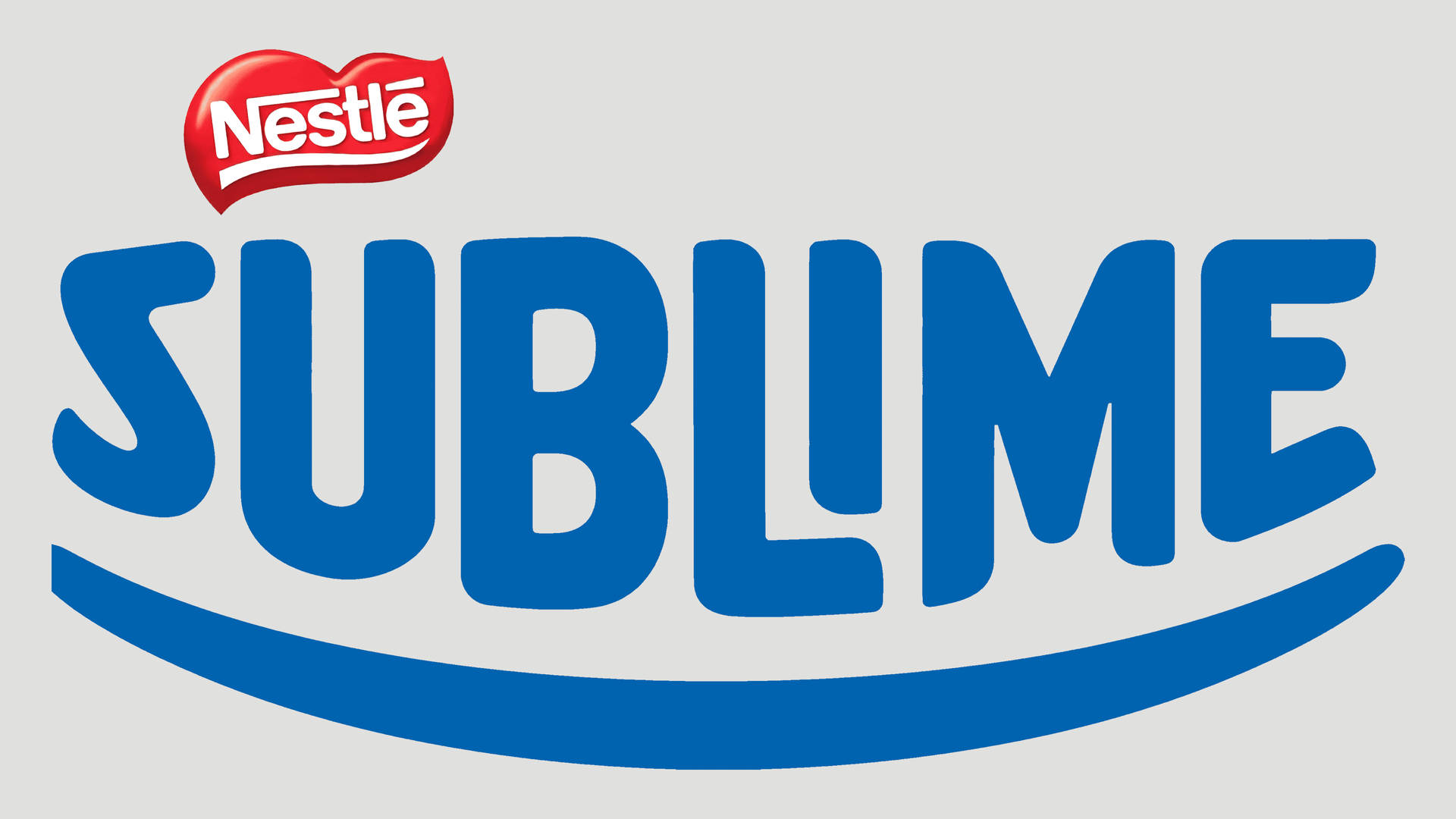 灰色背景上藍色和紅色的Nestlé Sublime品牌標誌