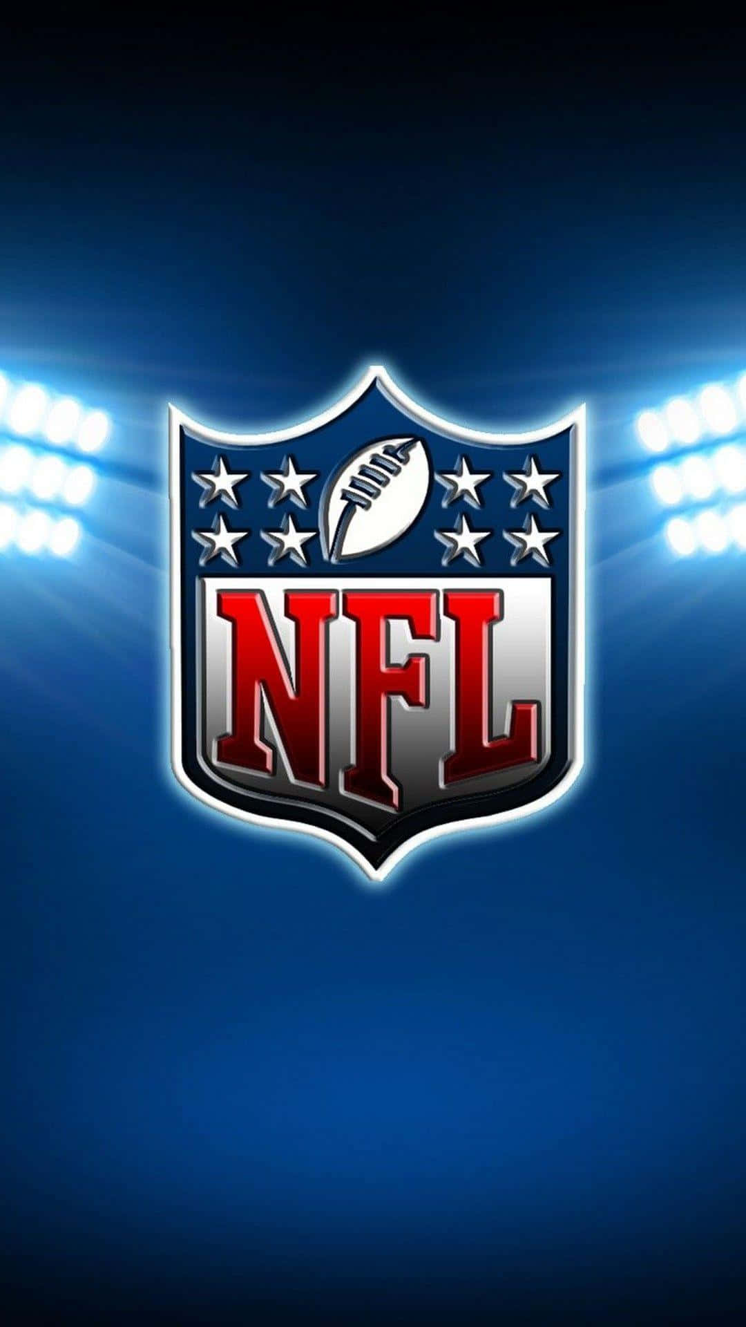 NFL 桌布 壁紙 — NFL 標誌在球場燈光下閃耀，背景為深藍色漸變。