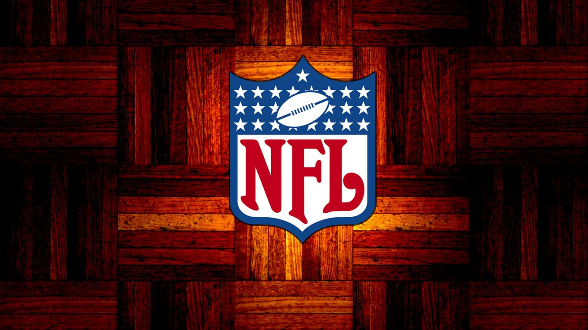 NFL 桌布 壁紙 — NFL 標誌居中於暖色調木質拼花地板背景上，帶有發光高光。