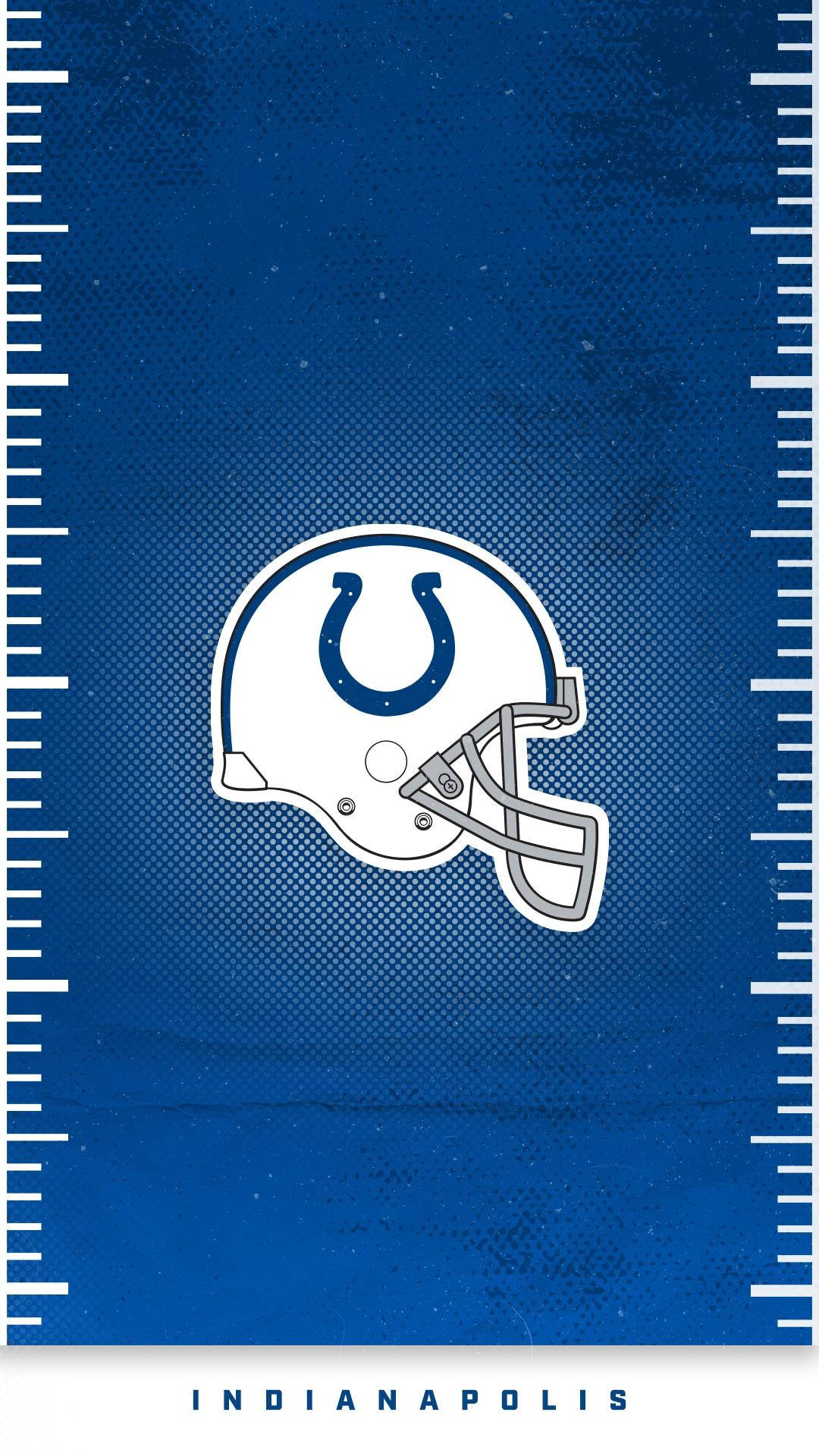 NFL印第安納波利斯小馬隊視覺藝術 壁紙 — 一個白色印第安納波利斯小馬隊美式足球頭盔，藍色馬蹄鐵標誌居中，置於有紋理的藍色背景上，並以白色尺子框住。