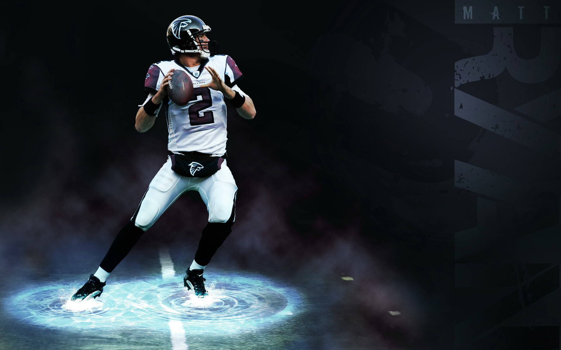 NFL美式足球運動員賽場瞬間 壁紙 — 一位身穿亞特蘭大獵鷹隊裝備的美式足球四分衛，在戲劇性的聚光燈下，腳下閃爍著藍色能量，準備投球。