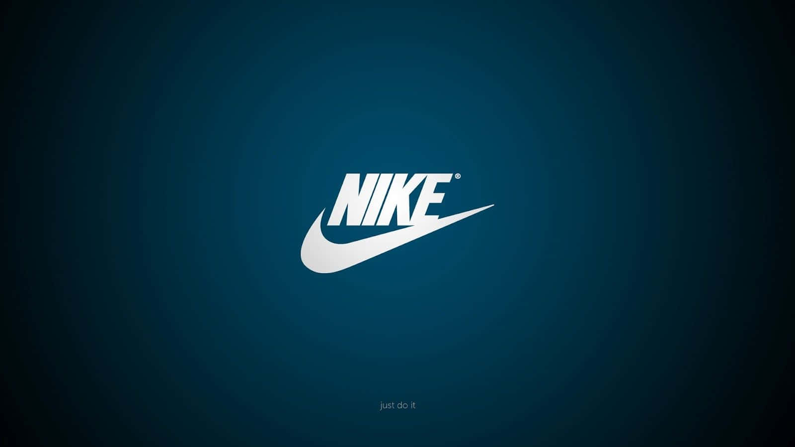 Nike盒裝標誌 壁紙 — 白色Nike swoosh標誌居中於漸變藍色背景上，帶有微妙的徑向照明。