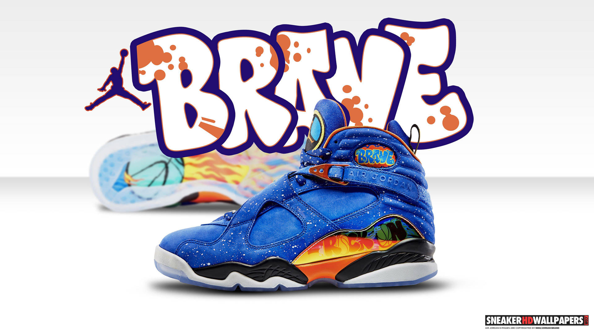 藍色和橙色 Air Jordan 8 運動鞋，帶有 'BRAVE' 塗鴉文字和籃球圖案。