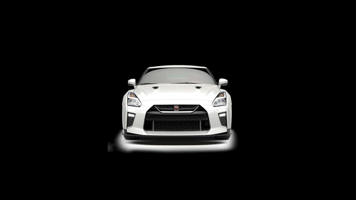 白色日產GT-R跑車在黑色背景下照亮。