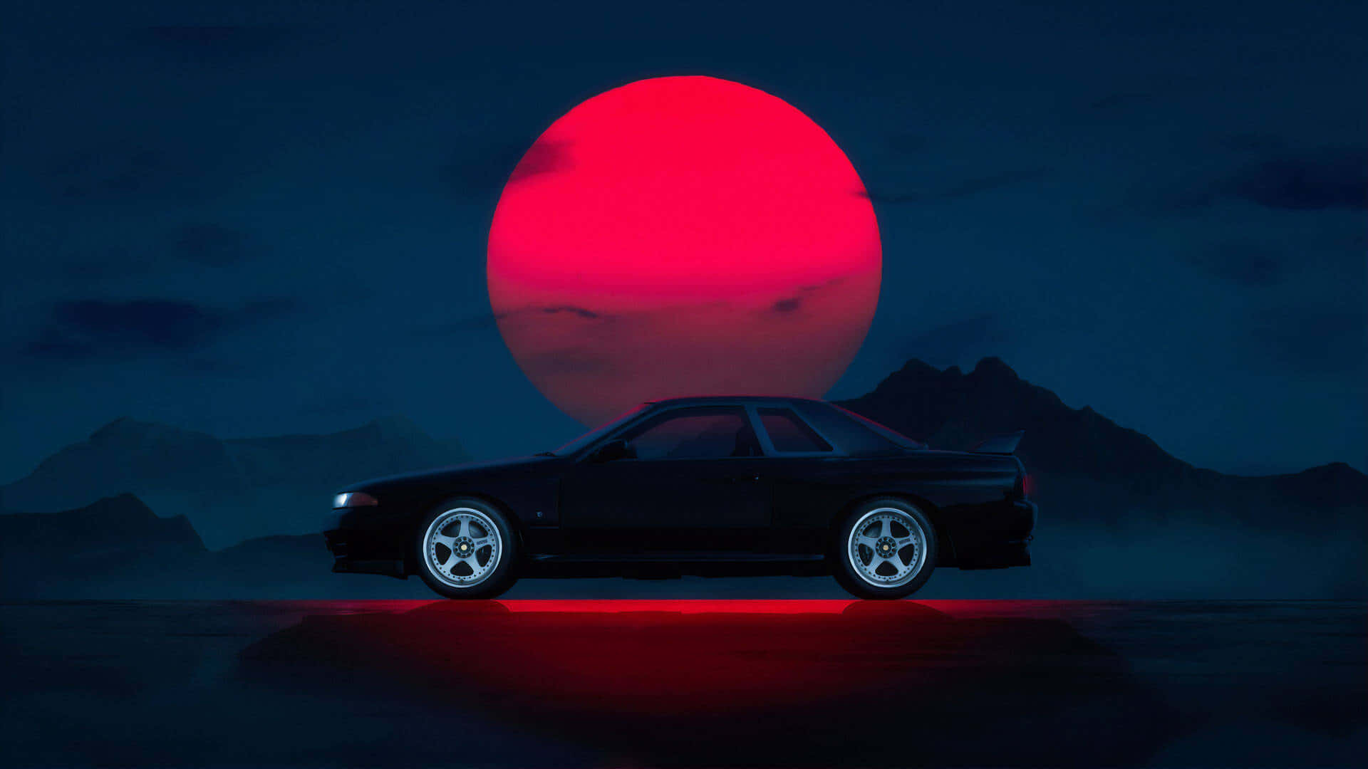 駕馭賽道，Nissan Skyline R33 無敵風采 壁紙 — 一輛時尚的黑色跑車在夜間以霧氣繚繞的山脈上空巨大的紅色月亮為背景形成剪影。