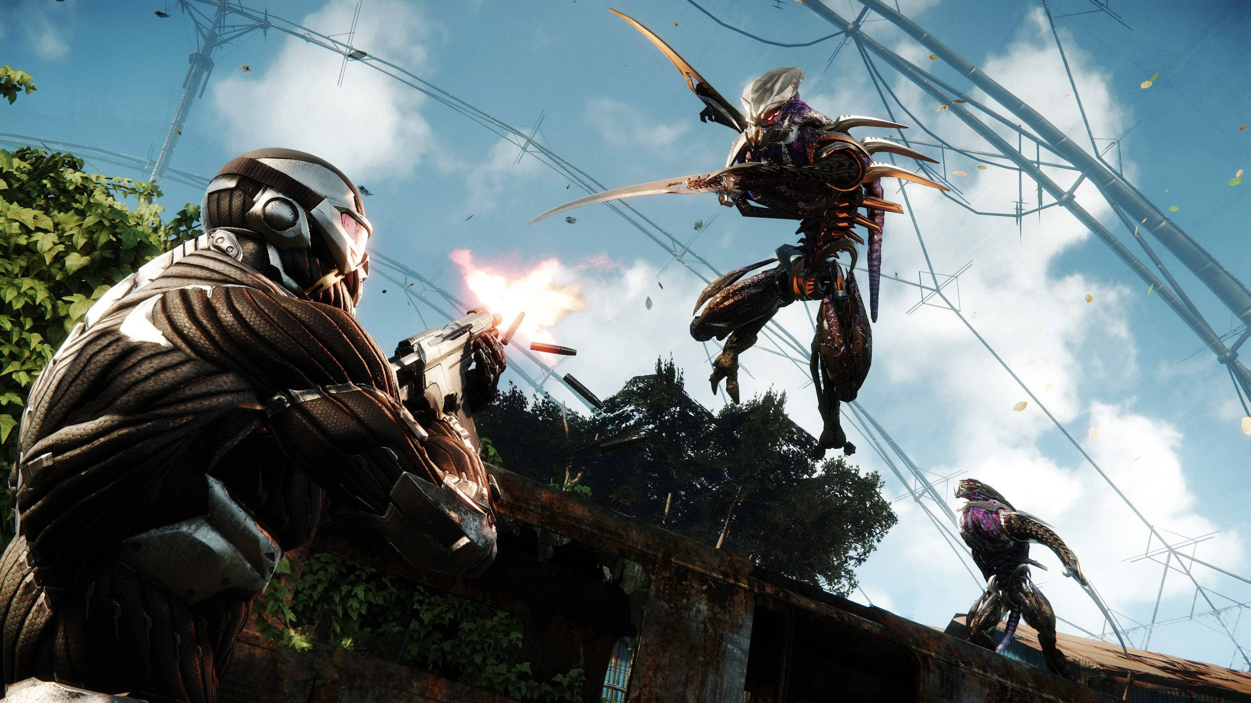 Nomad在《Crysis Remastered》中空中射擊敵人 壁紙 — 一名身穿黑色盔甲的士兵在晴朗藍天下，於雜草叢生的廢墟中向懸浮的外星生物開火。