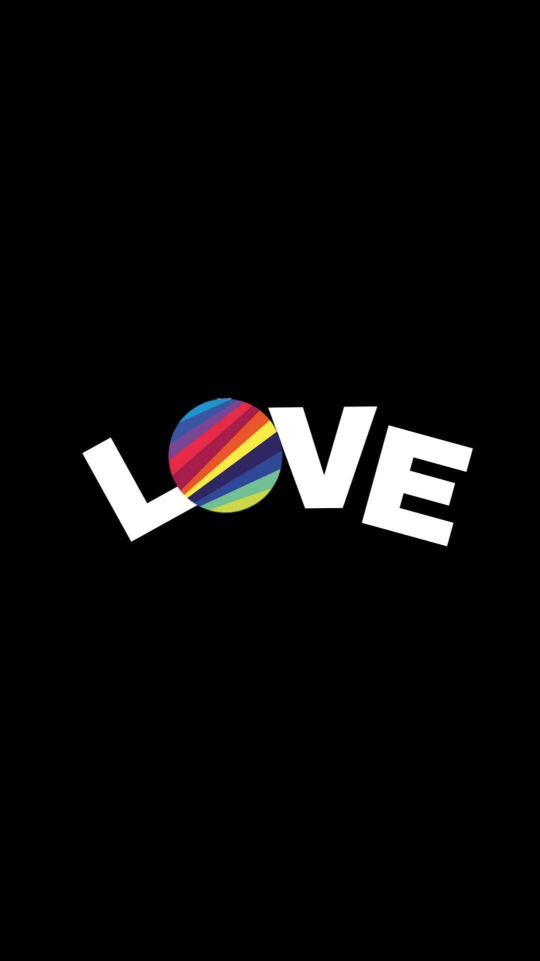 黑色背景上粗體白色文字 LOVE，O 為彩虹圓圈