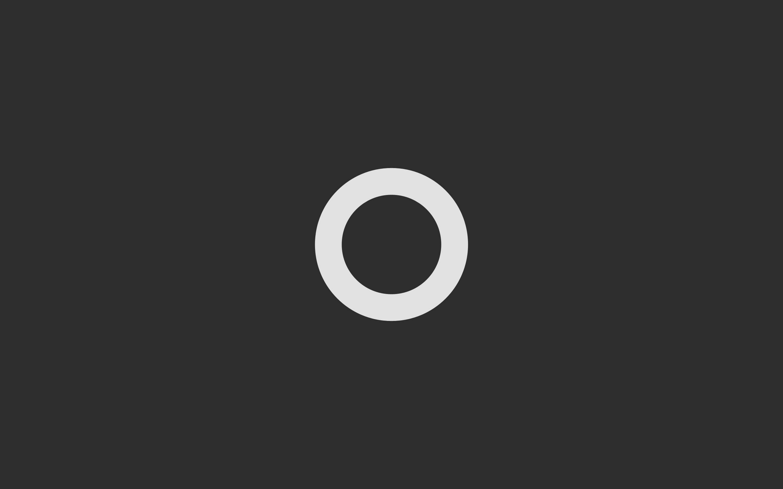 極簡風格桌面字母O 壁紙 — 一個極簡的白色圓環置於深灰色背景中央，形成強烈的幾何對比。