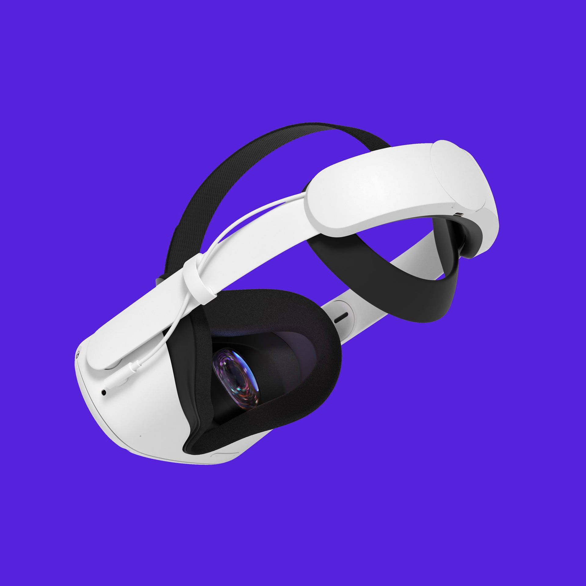 Oculus Quest 2紫色背景 壁紙 — 一個時尚的白色VR頭戴式裝置，配有黑色帶子，在充滿活力的紫色背景上漂浮。