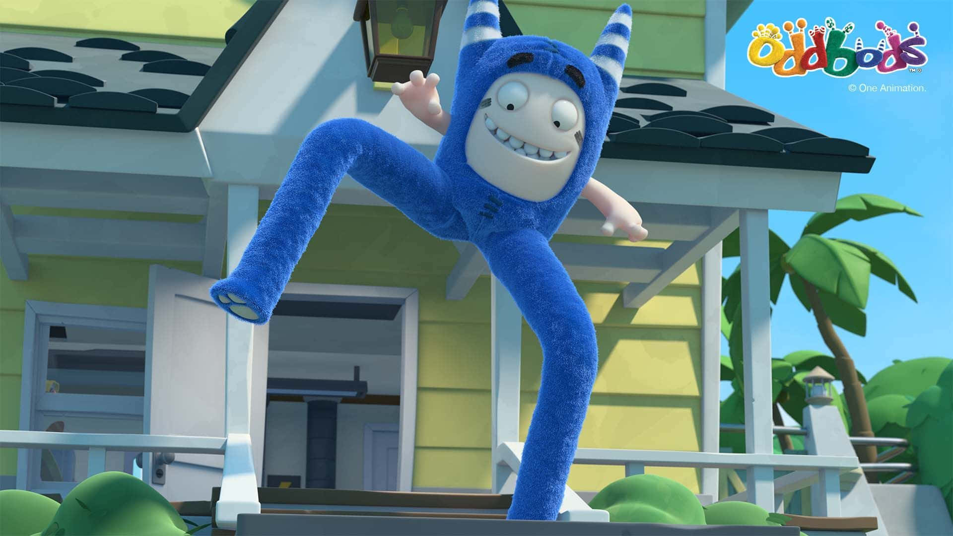 Oddbods節目中的Pogo長腿出場 壁紙 — 一個藍色毛茸茸有角的動畫角色在藍天下黃色房子前的門廊上快樂地跳躍。