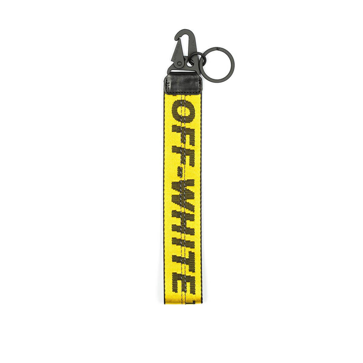 黃色 Off-White 品牌鑰匙扣，配有黑色金屬夾和環。