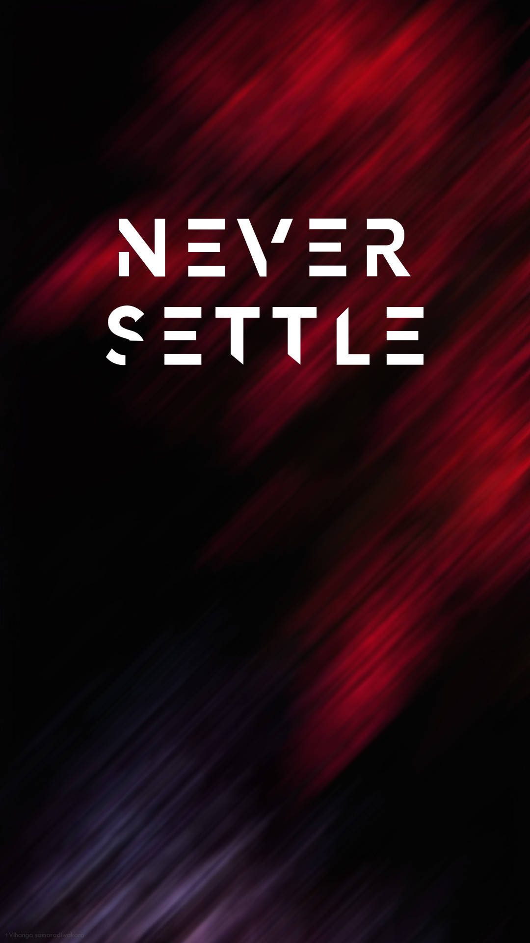 OnePlus 桃花木 Never Settle 壁紙 — 粗體白色文字「NEVER SETTLE」在動態紅黑運動模糊背景上脫穎而出。