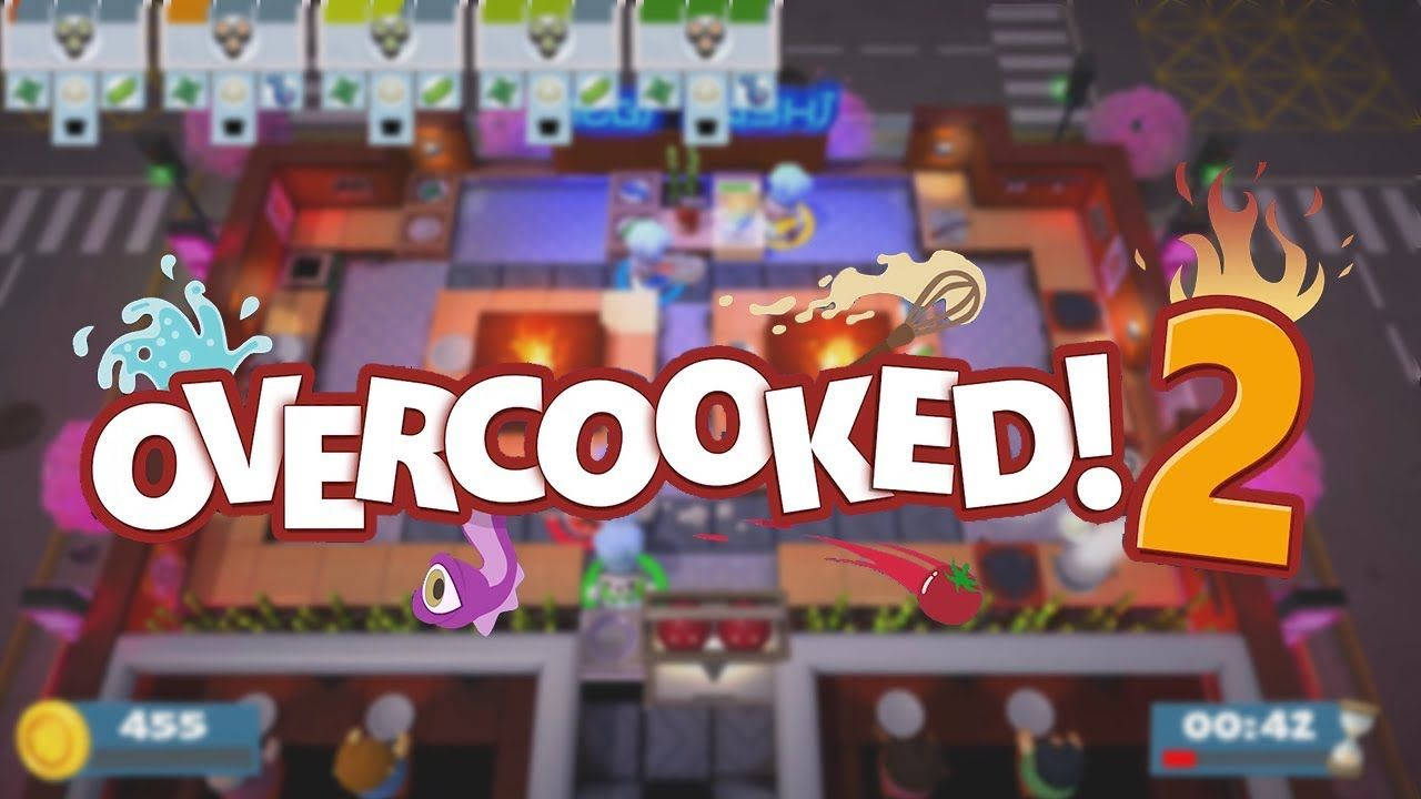 Overcooked 2 加載畫面 壁紙 — 《Overcooked 2》中混亂的廚房場景，食物四處飛舞，廚師們忙碌不已，以色彩繽紛的卡通風格呈現。