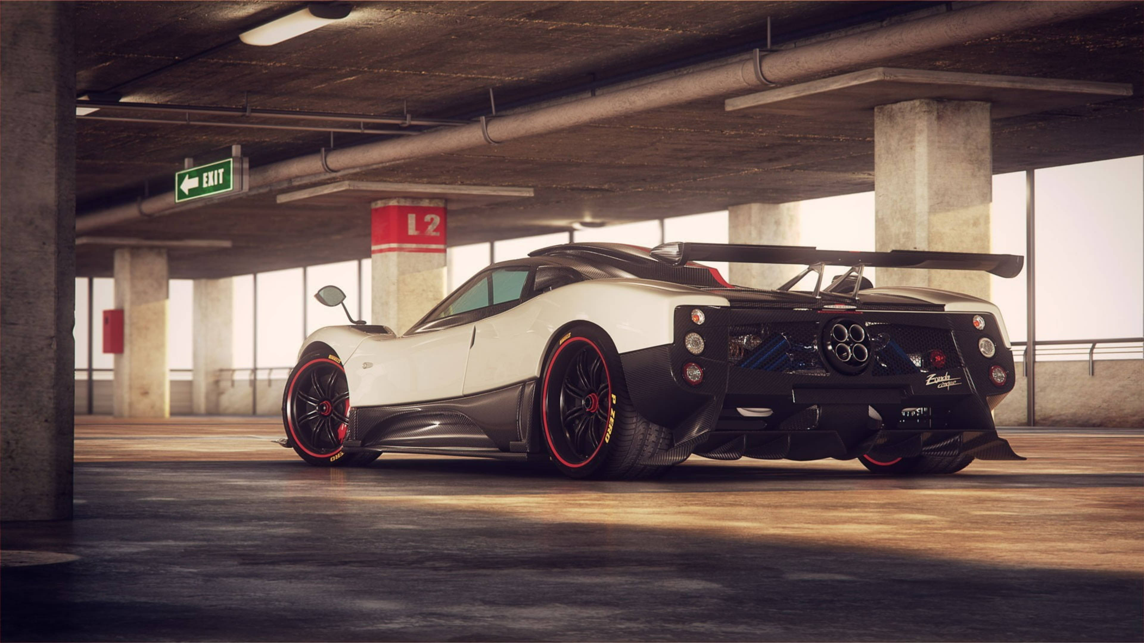 Pagani Zonda 黑白配色 壁紙 — 一輛帶有紅色點綴的白色和黑色帕加尼Huayra停在混凝土停車場，光線柔和。