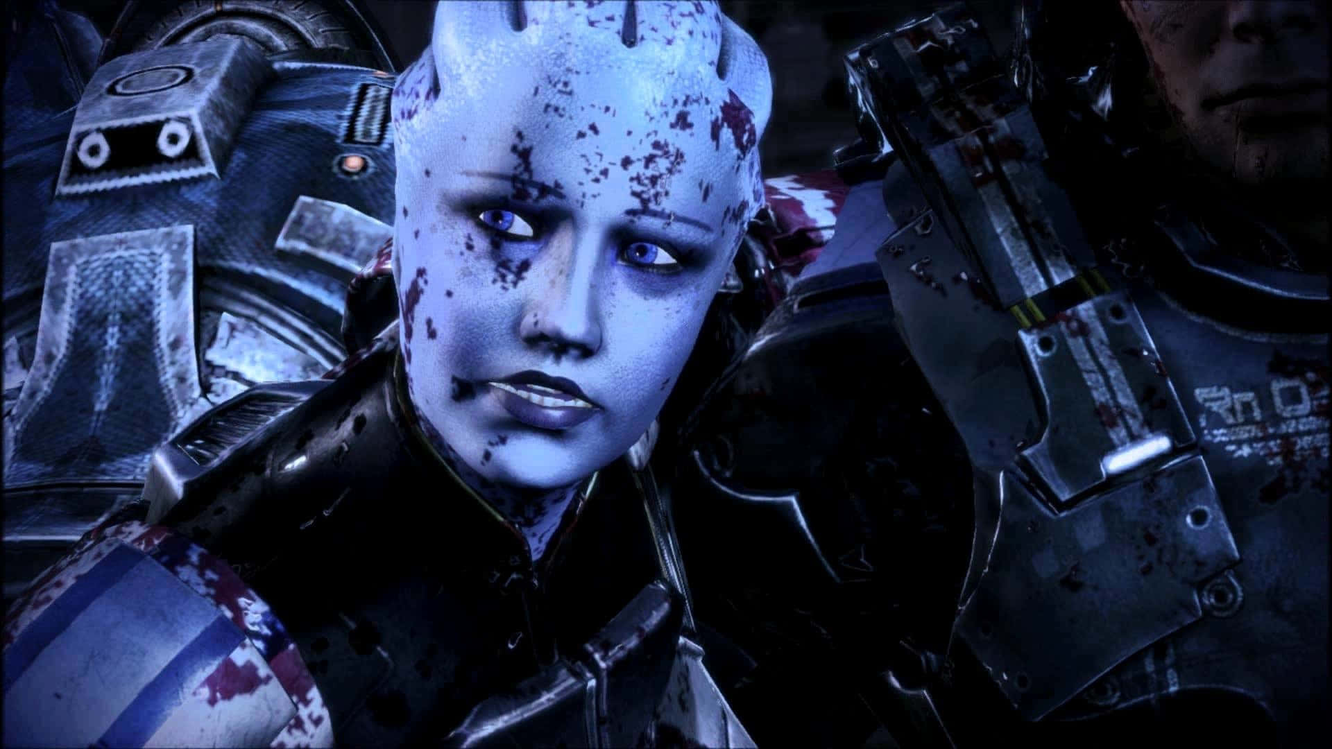 Mass Effect Femshep 桌布 壁紙 — 一個蒼白藍皮膚的外星戰士穿著重型裝甲，臉上和裝備上濺滿鮮血，眼神強烈地凝視。