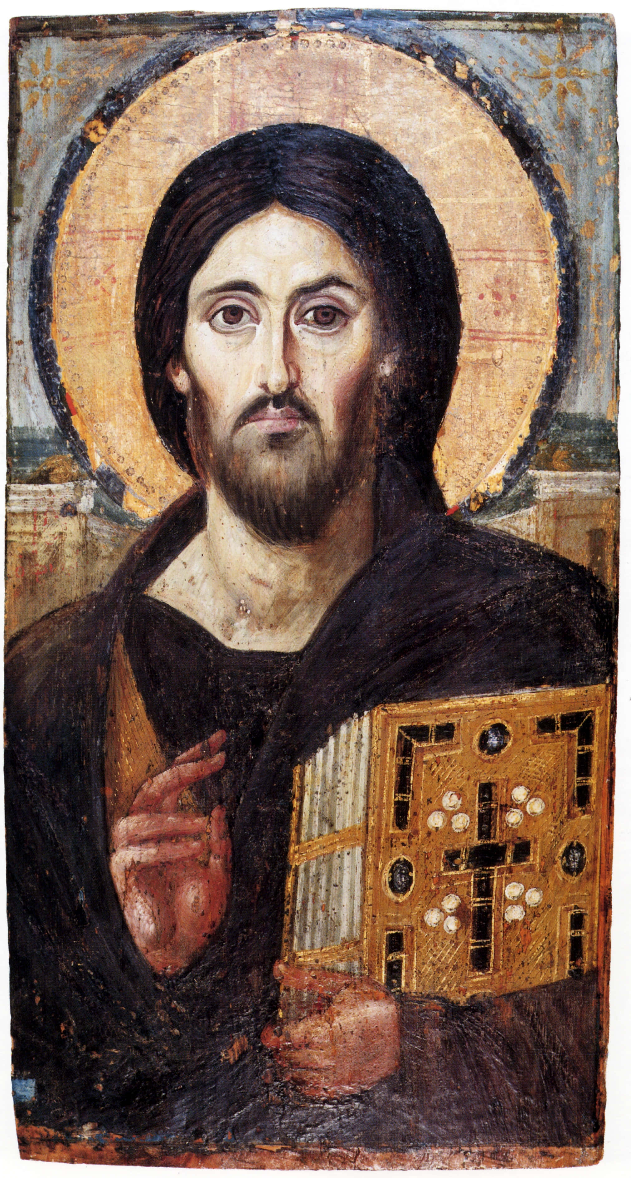 耶穌基督 Pantocrator 照片 壁紙 — 一個古老的宗教圖標描繪了一個留鬍子的男人，頭頂光環，手持一本帶有十字架和花卉圖案的書。