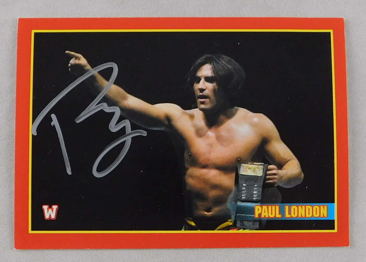 摔角手Paul London手持冠軍腰帶的親筆簽名WWE交易卡。