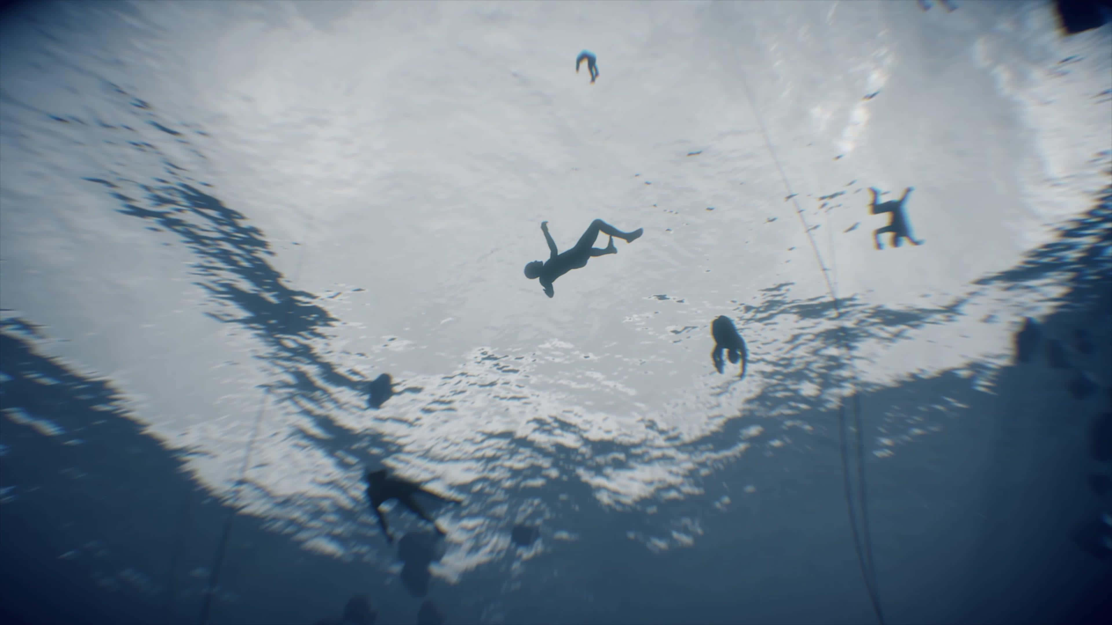 《死亡搁浅》遊戲現已登陸PC玩家 壁紙 — 潛水員的剪影在漣漪的水面下失重漂浮，下方投射出斑駁的陰影。