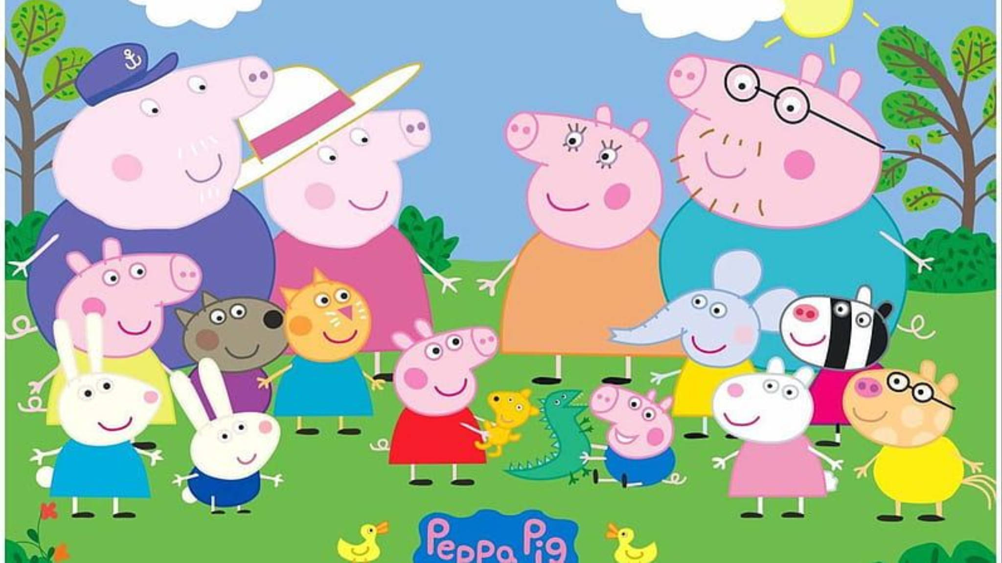 小豬佩奇 桌布 壁紙 — Peppa Pig 同佢嘅家人同朋友喺晴朗嘅藍天之下，喺一個明亮嘅綠色戶外場景中開心咁聚集。