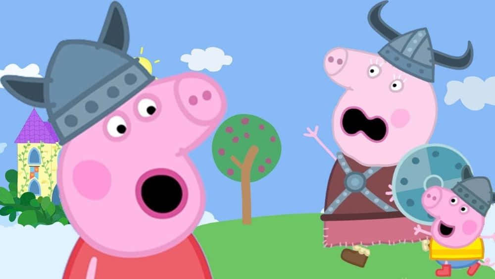 Granny Pig 桌布 壁紙 — Peppa Pig 同家人扮成維京人，戴住頭盔同盾牌，喺明亮嘅卡通風景入面。