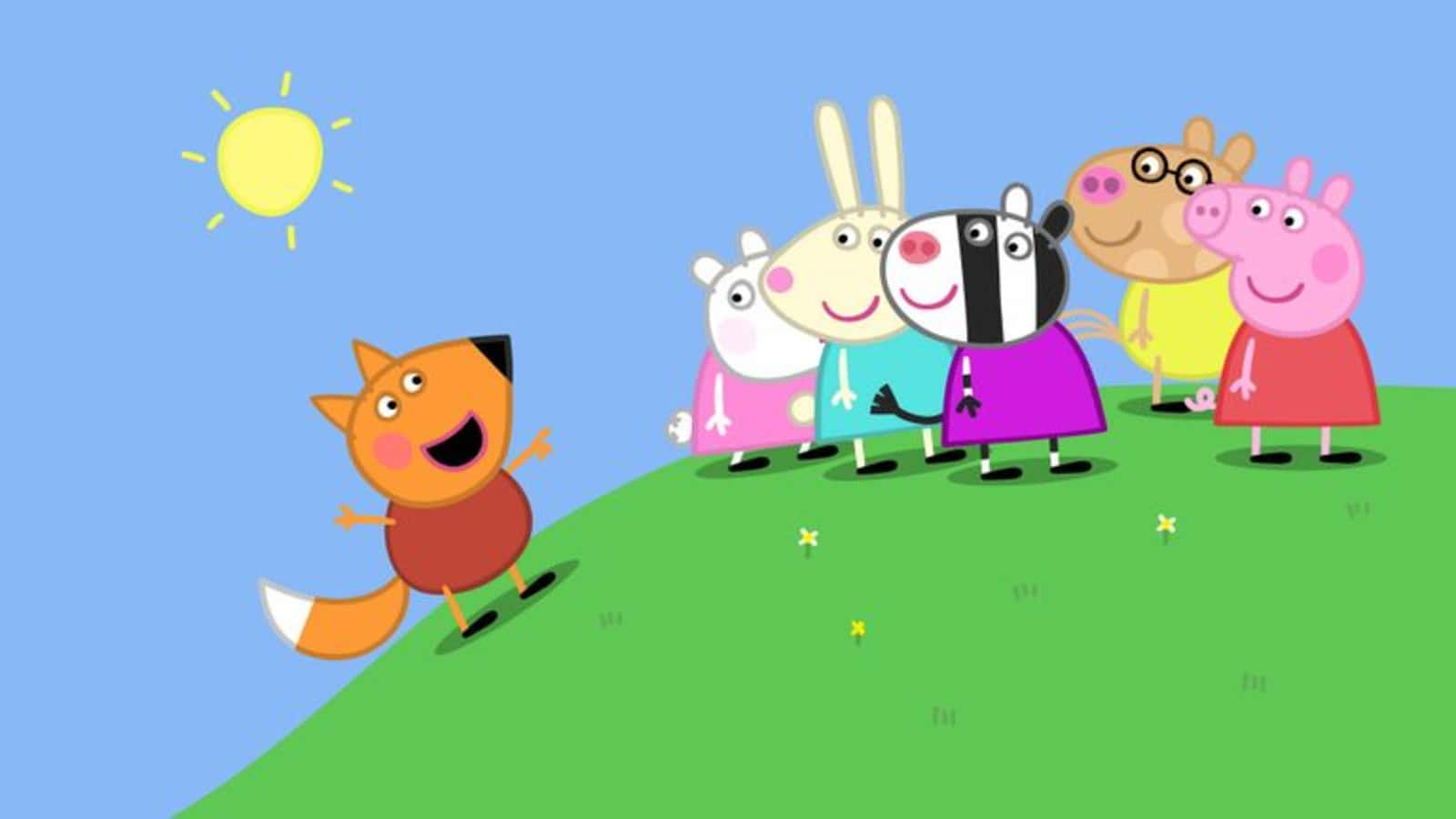 Freddy Fox 桌布 壁紙 — Peppa Pig 同朋友企喺一個有草嘅山丘上，喺明亮嘅太陽下，一隻狐狸開心噉向佢哋跑緊過嚟。