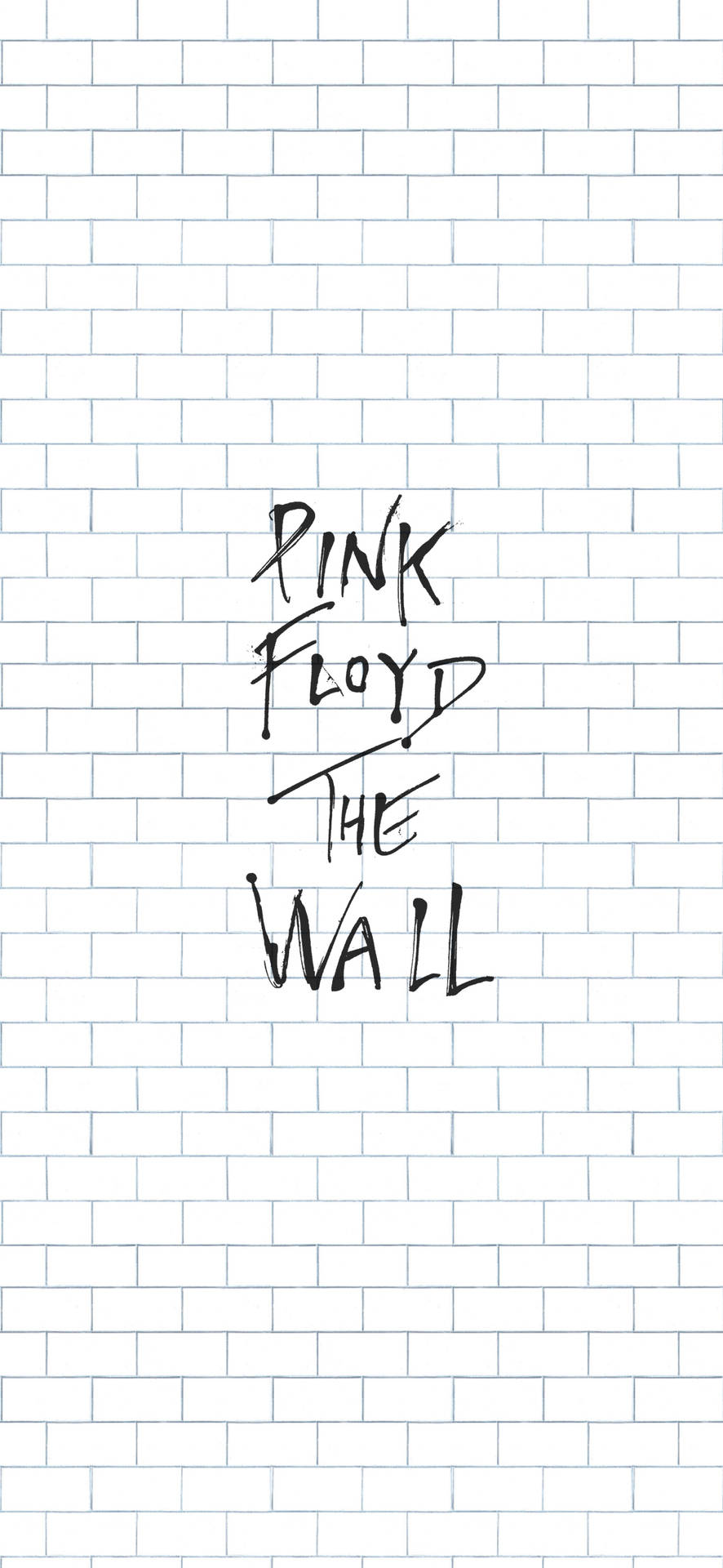 Pink Floyd The Wall 專輯標題以黑色手寫字體顯示在白色磚牆上。