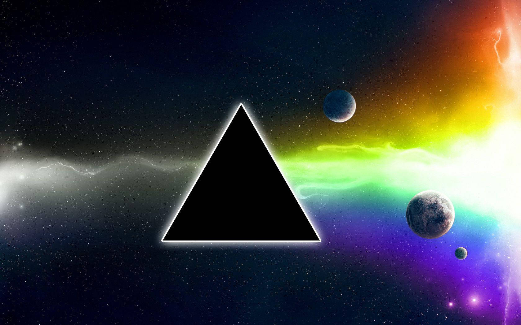 黑色三角形帶發光邊緣，在色彩繽紛的太空中有行星和星星