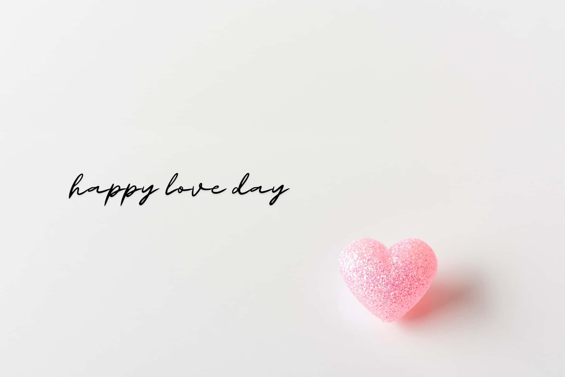 粉紅色閃粉心形配上 happy love day 文字在白色背景上 — 粉紅色心形動圖 壁紙