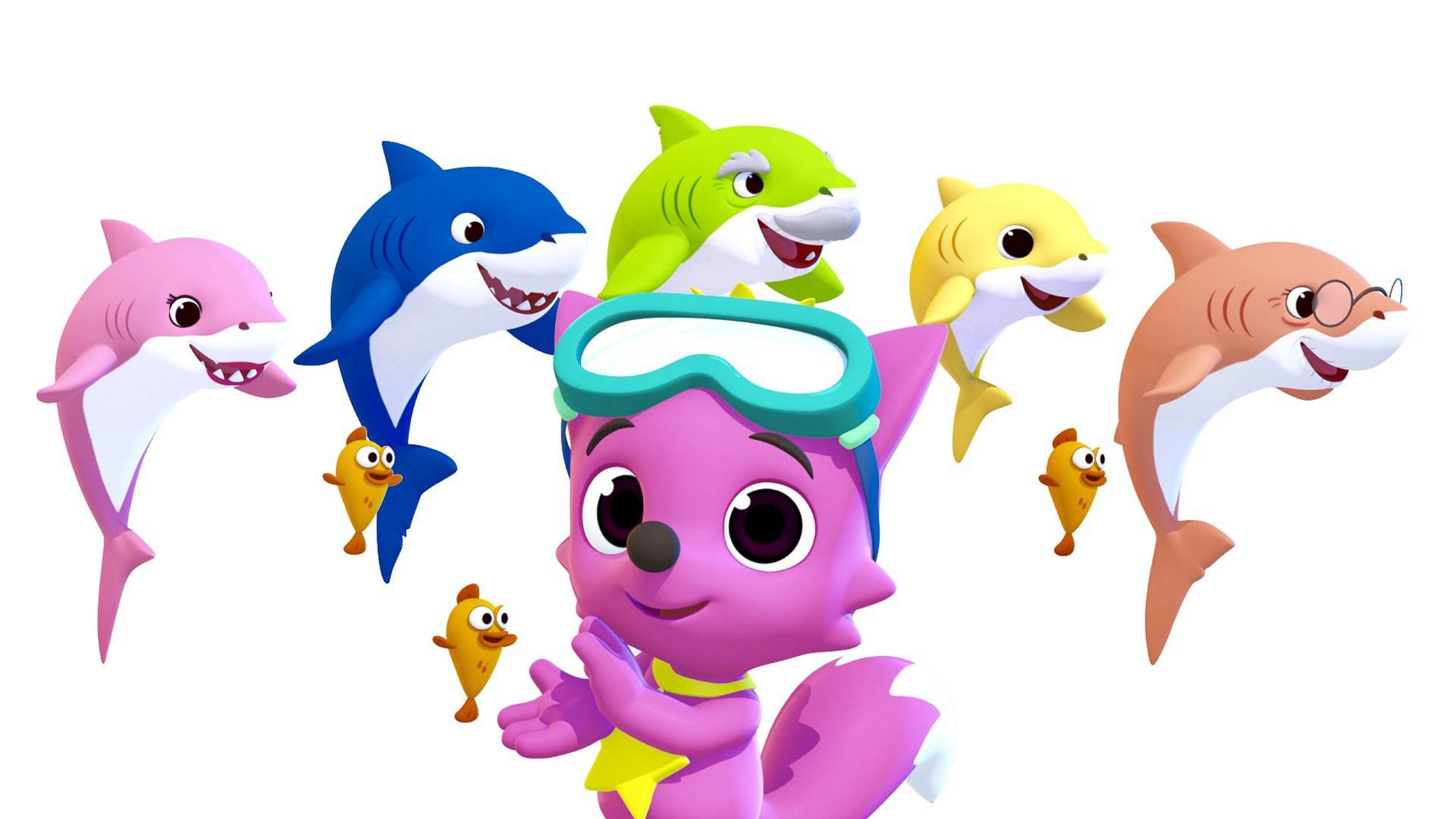 Pinkfong Baby Shark 3D藝術 壁紙 — 一隻戴著護目鏡的開心紫色卡通狐狸，被色彩繽紛的笑臉鯊魚和小魚圍繞在白色背景上。