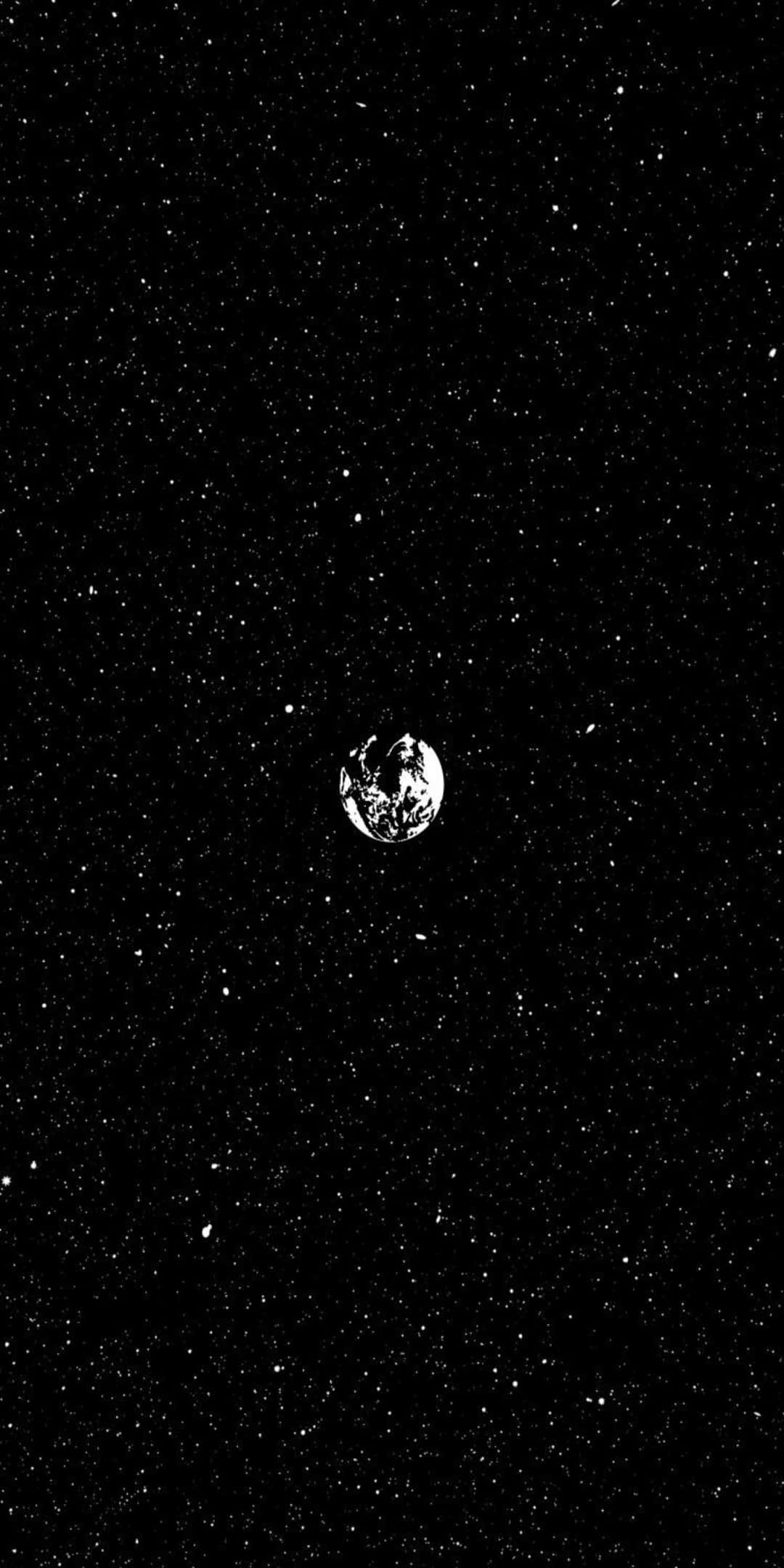 Pixel 3 最簡背景：裂縫月漂浮 壁紙 — 孤獨的地球漂浮在星空中，以強烈的黑白對比呈現宇宙的孤寂。