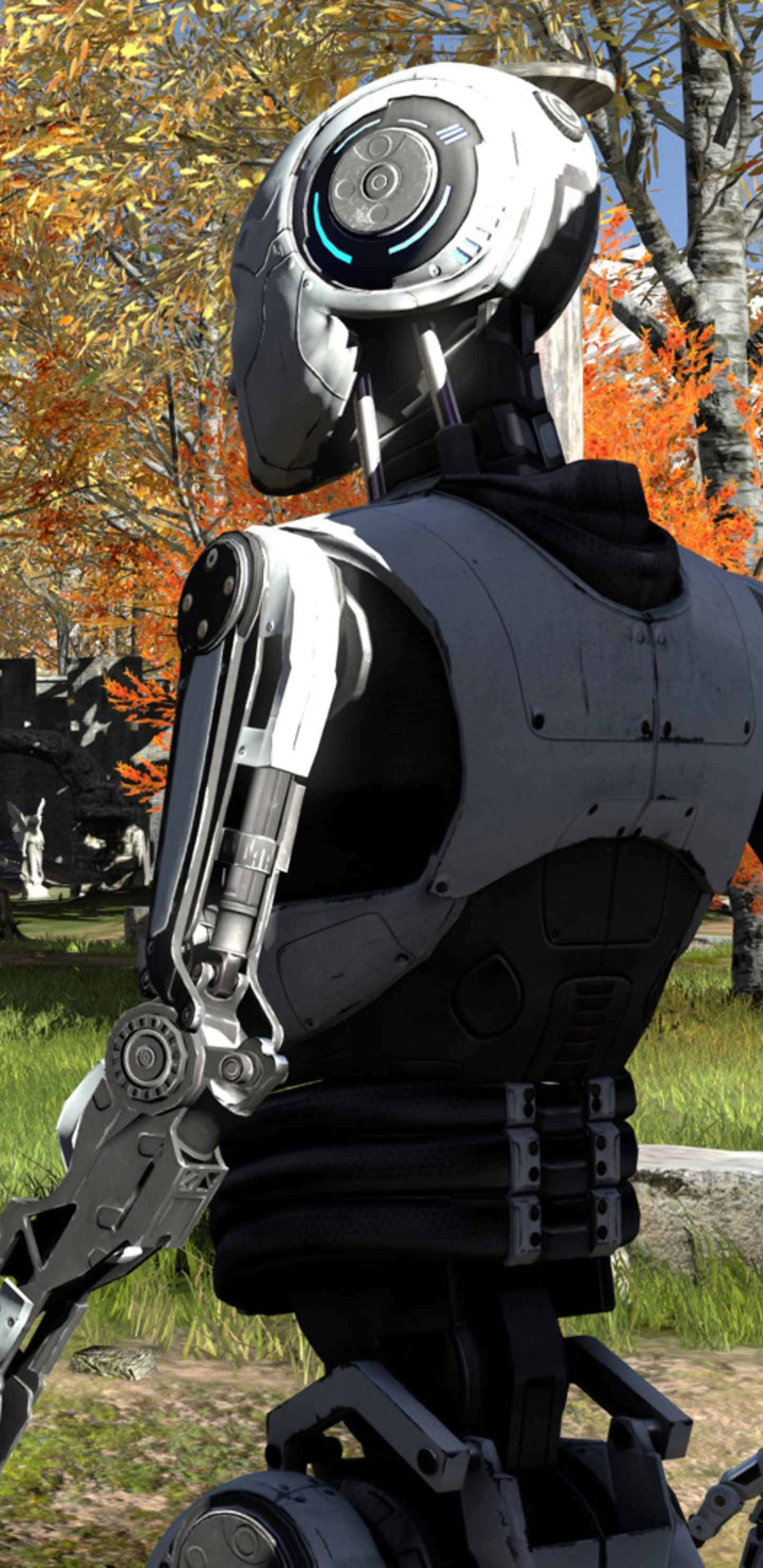 Pixel 3xl The Talos Principle 背景：Uriel 背對觀者 壁紙 — 一個時尚的銀色機械人站在充滿活力的秋日森林中，周圍有橙色樹葉和綠色草地。