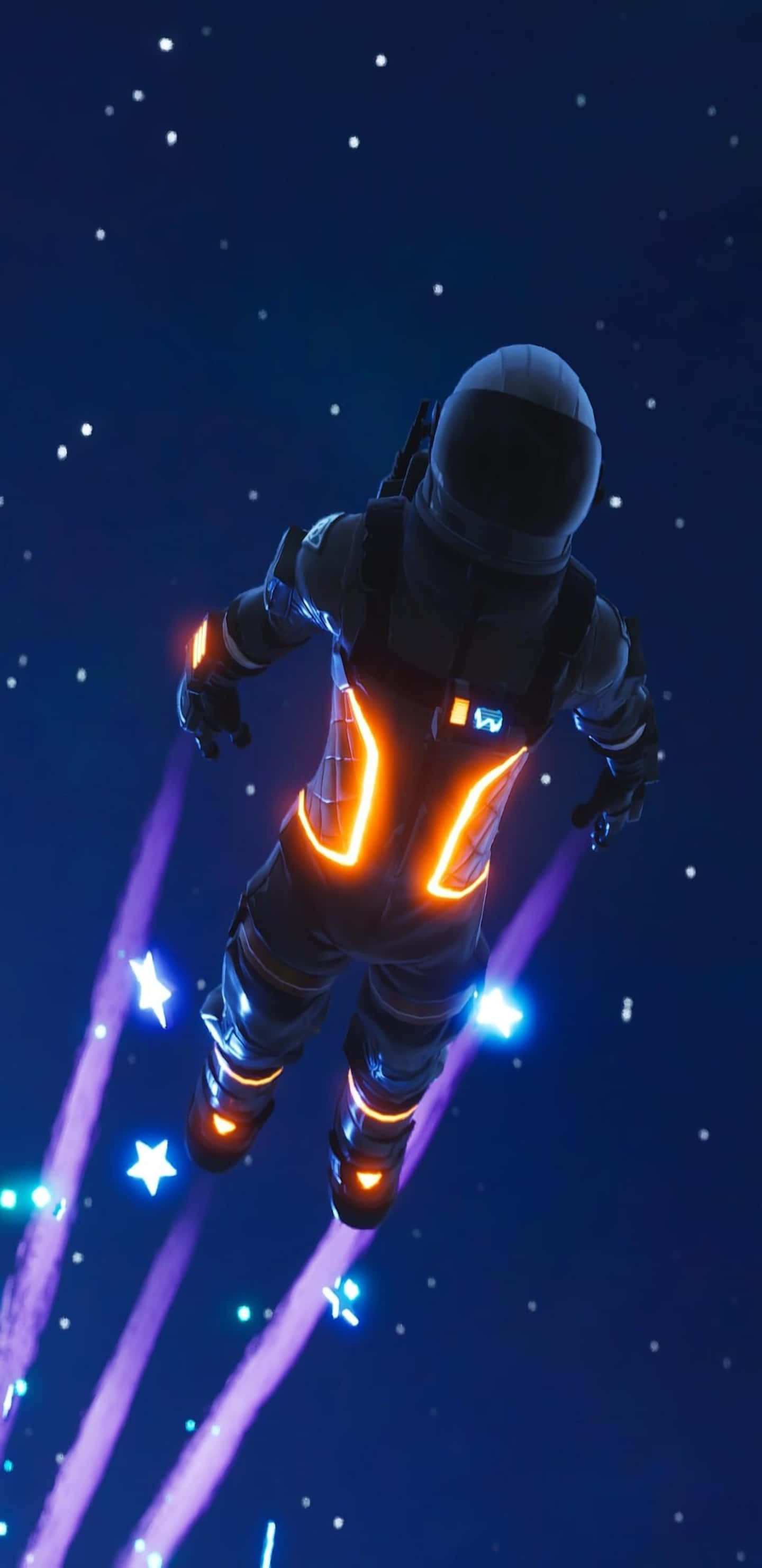 Pixel 3XL 飛行暗航者《Fortnite 火力全開》背景 壁紙 — 一名太空人漂浮在繁星點點的夜空中，身後留下發光的橙色和藍色軌跡。