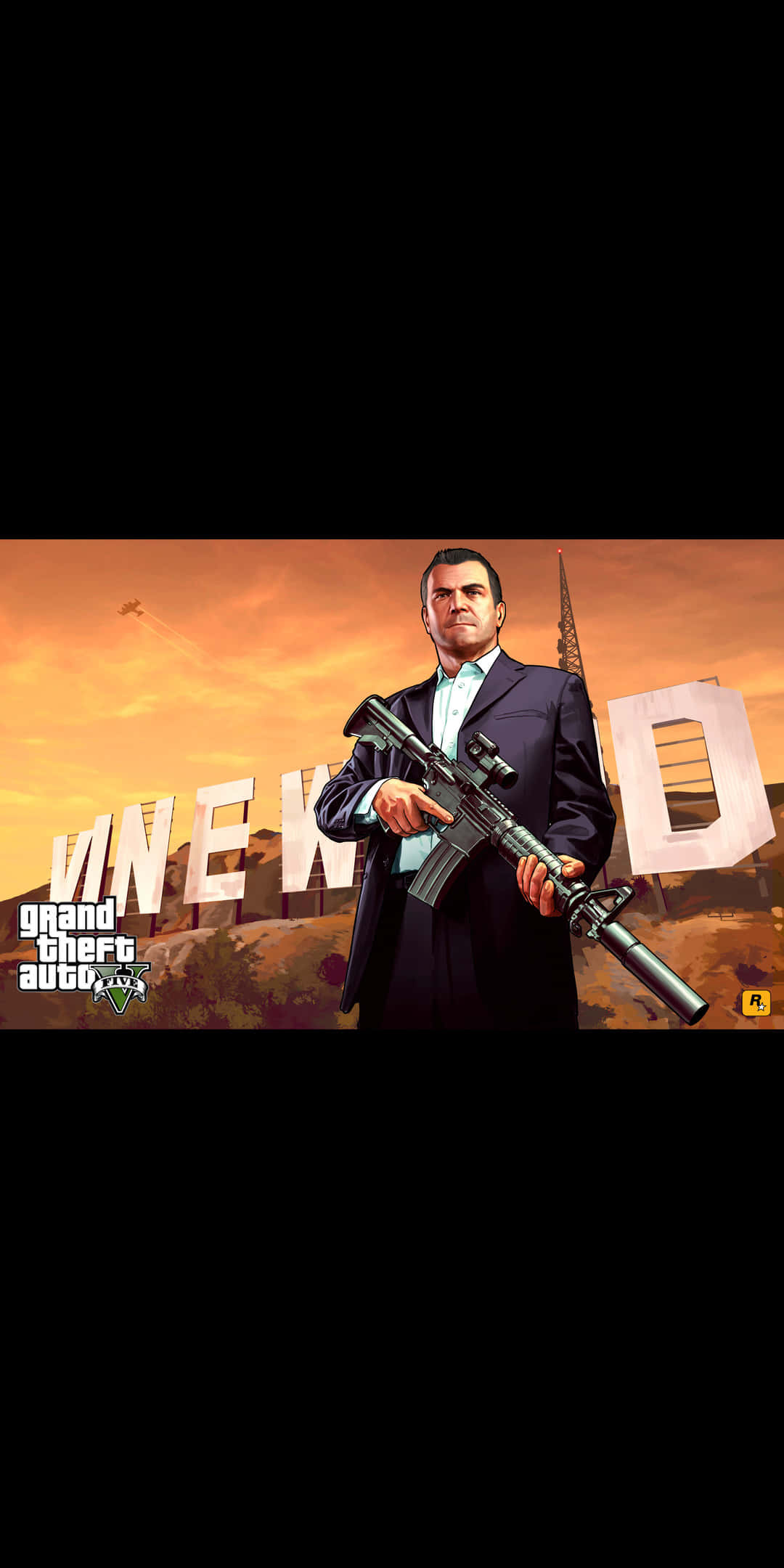 Pixel 3顯示《GTA V》虛擬城市 壁紙 — 一名穿西裝的男子在日落背景下持步槍，背景有「NEW D」字母和教堂尖頂。