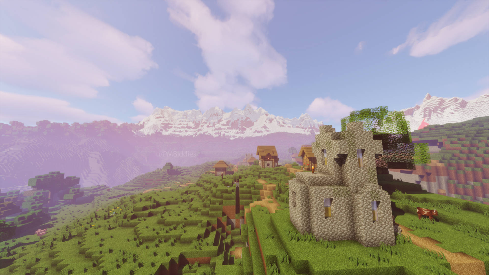Minecraft村莊，城堡在綠色山丘上，背景有雪山。