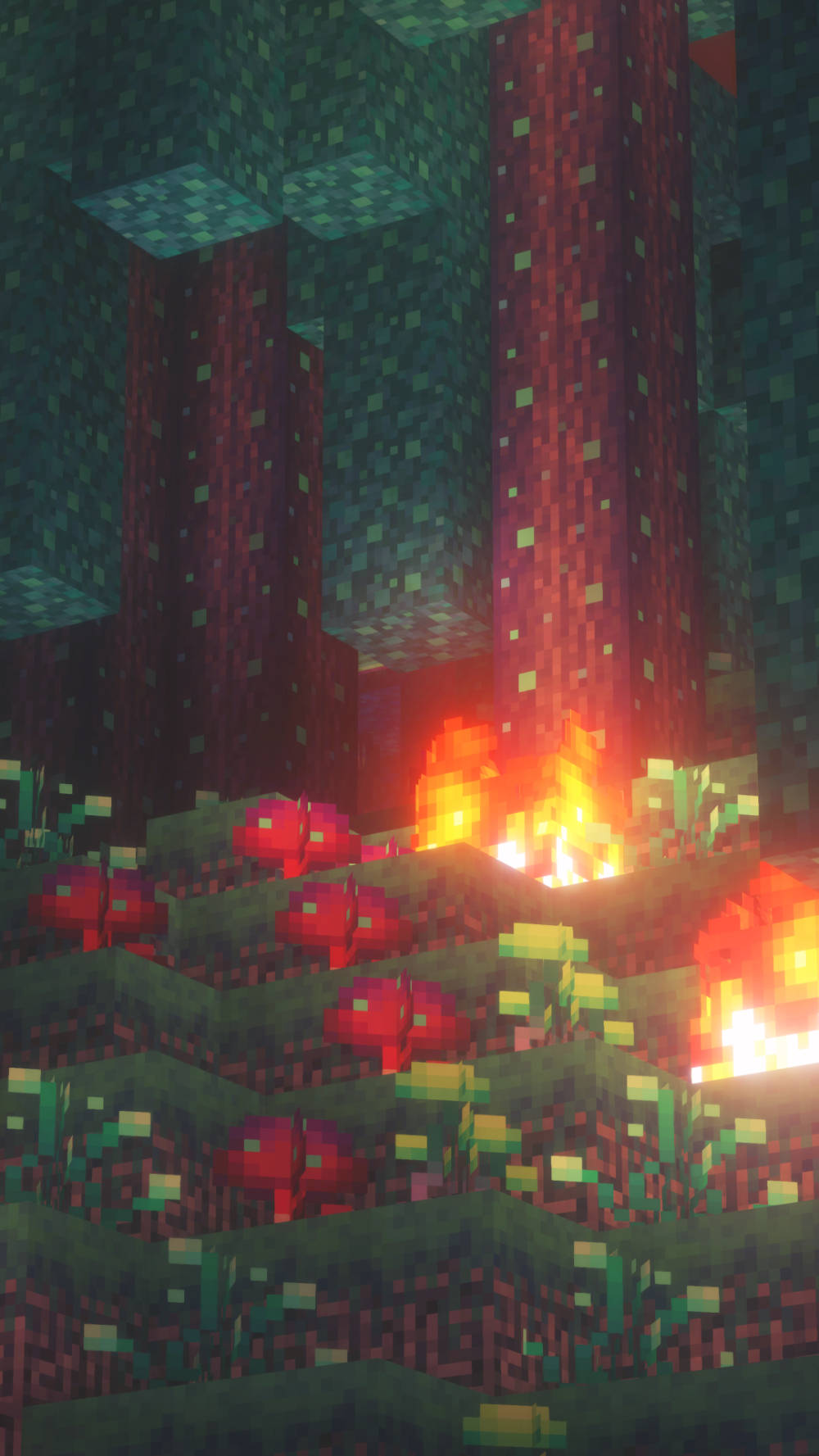 Minecraft 中的地獄景觀，有熔岩流和紅色地獄岩柱