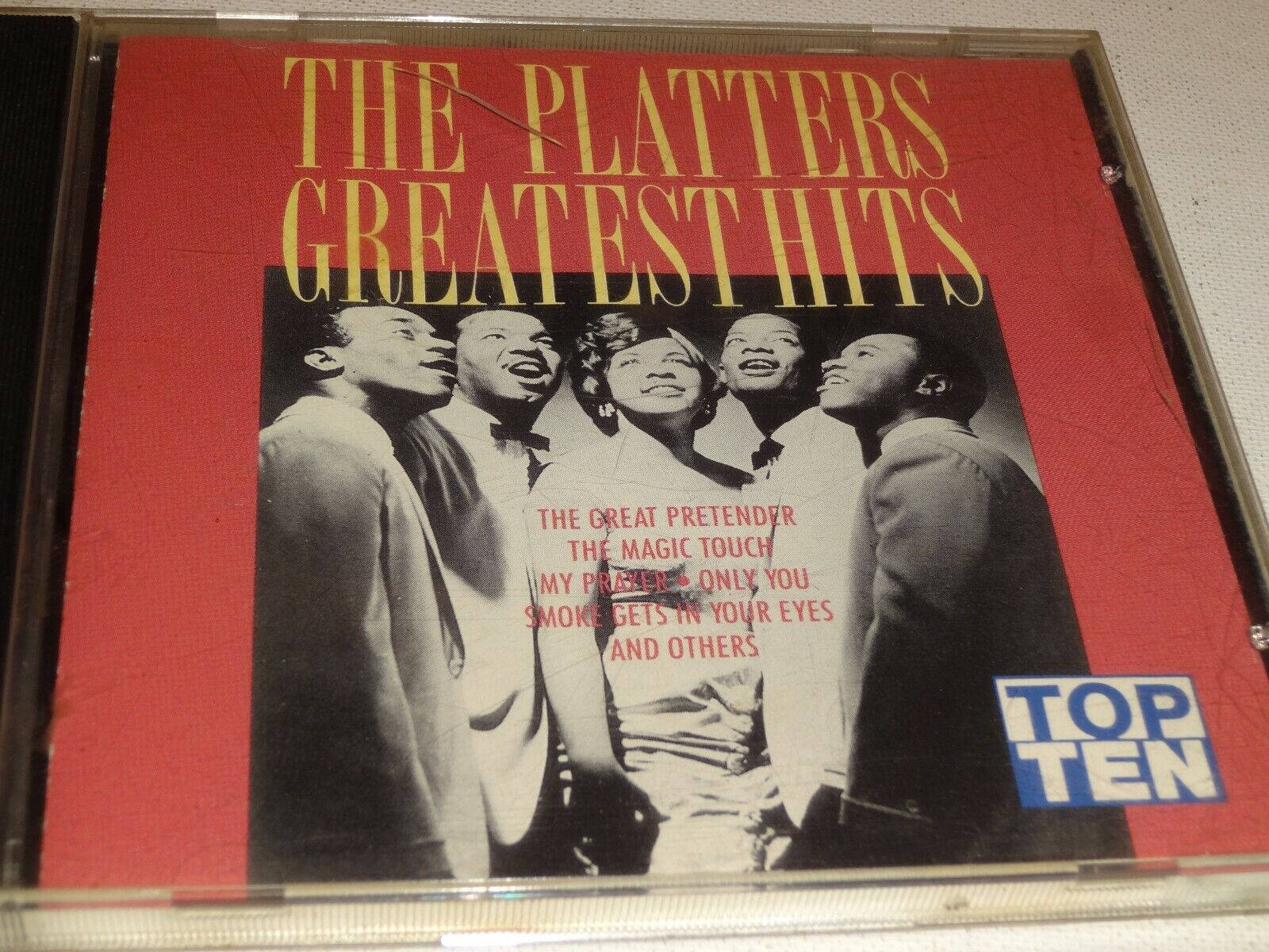 The Platters Greatest Hits 的CD封面，附有團體照片和歌曲名稱。