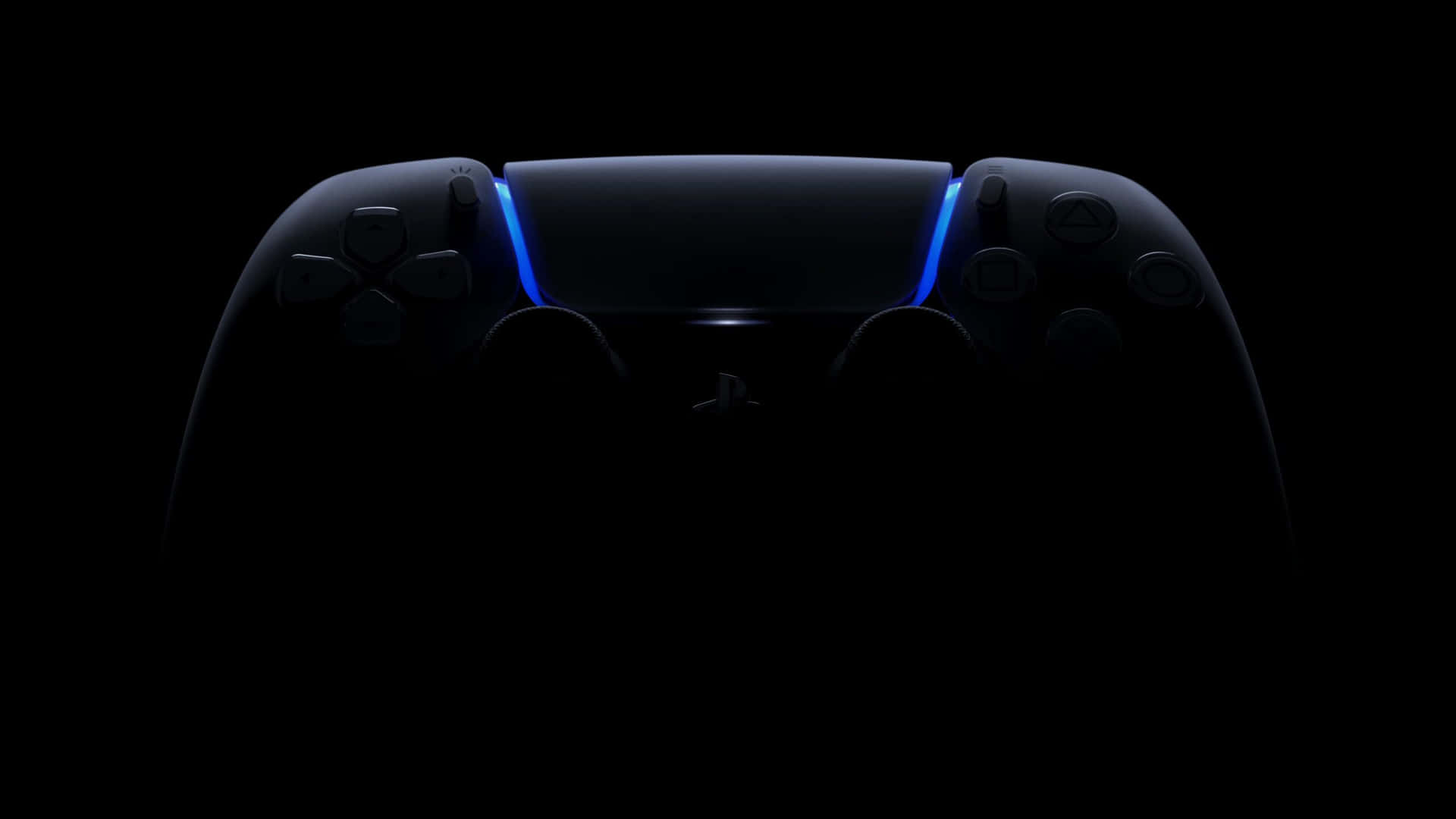 黑暗中發出藍光嘅 PlayStation 5 手掣