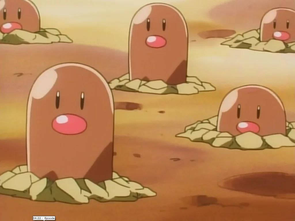 《Pokémon》系列中的沙漠地鼠Diglett 壁紙 — 幾隻地鼠寶可夢從沙地探出頭來，有著簡單的臉龐和粉紅色的臉頰，背景是沙漠般的環境。