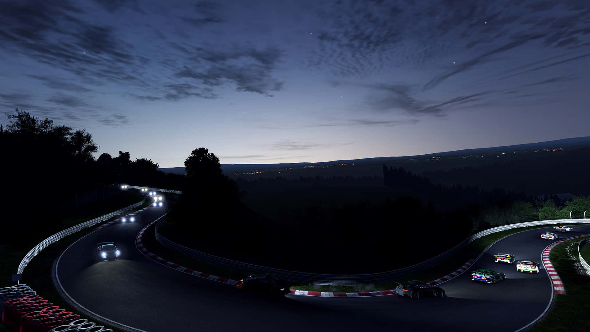 《Project Cars》夜間賽道競速高畫質背景 壁紙 — 夜間賽車在繁星點點的暮色天空下照亮蜿蜒的山路。
