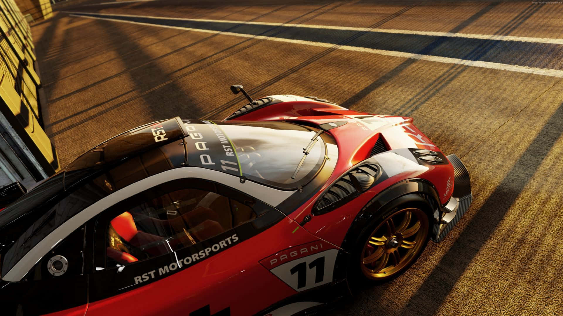 Project Cars 遊戲高清賽車背景 壁紙 — 一輛紅色和黑色的Pagani賽車，編號11，在陽光明媚的賽道上疾馳，投下長長的影子。