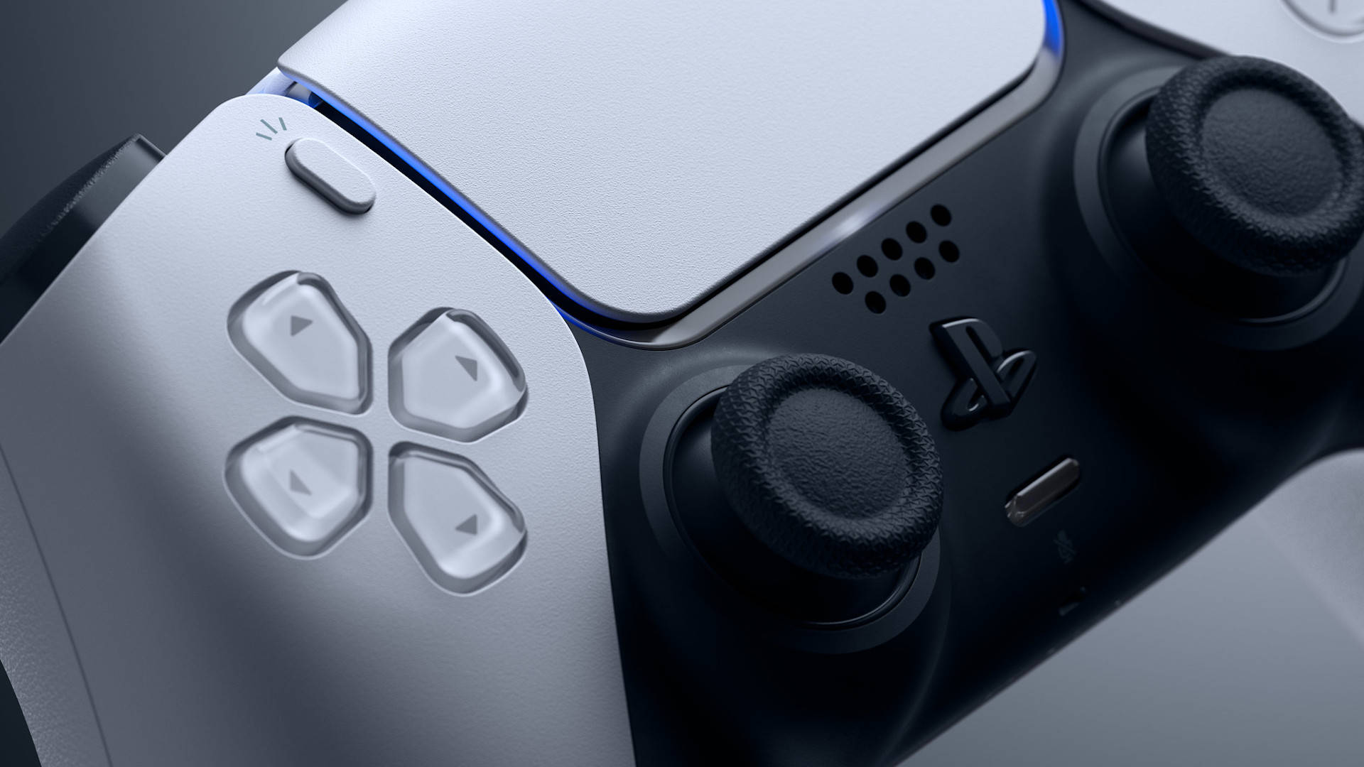 PS5 無線白色控制器 壁紙 — 白色和黑色光滑 PlayStation 5 控制器的特寫，帶有發光的藍色燈光點綴。