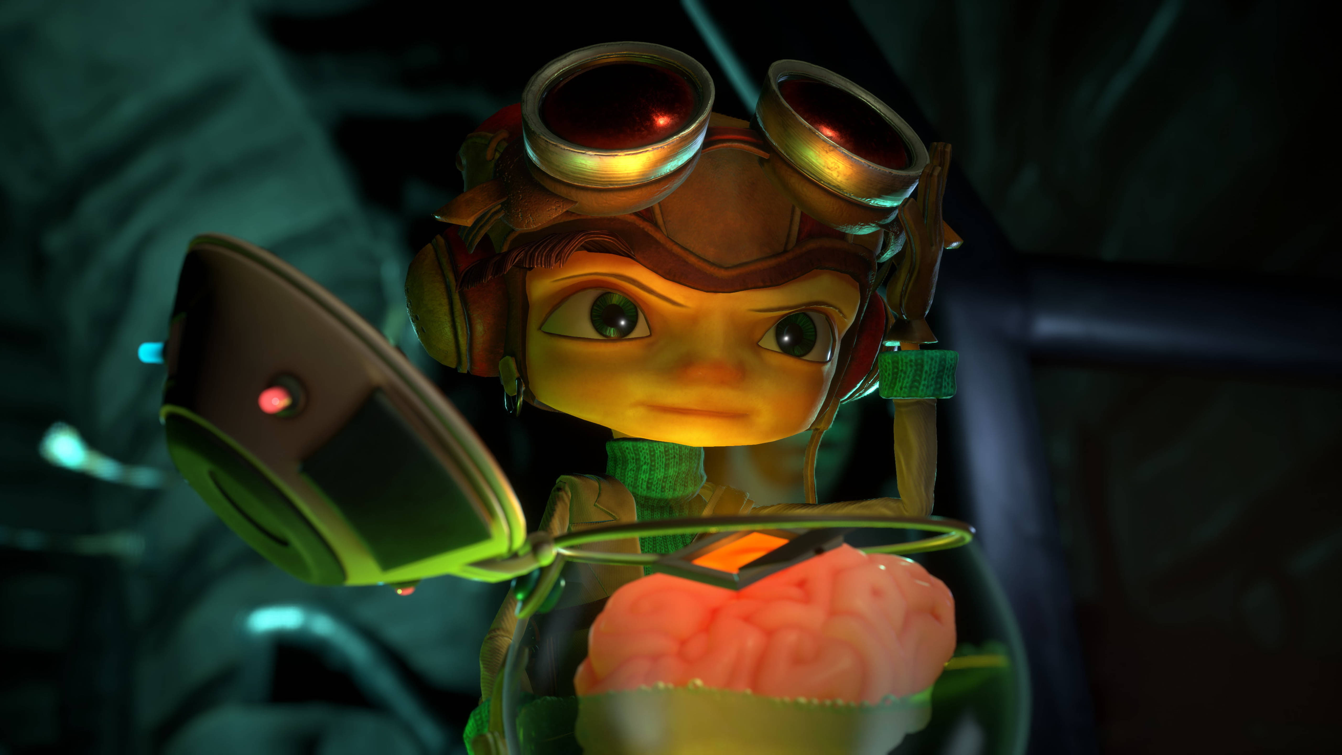 《Psychonauts 2》腦袋在罐中 壁紙 — 一個戴護目鏡的小型動畫角色在昏暗的綠色實驗室中，拿著一個在燈下罐子裡發光的大腦。
