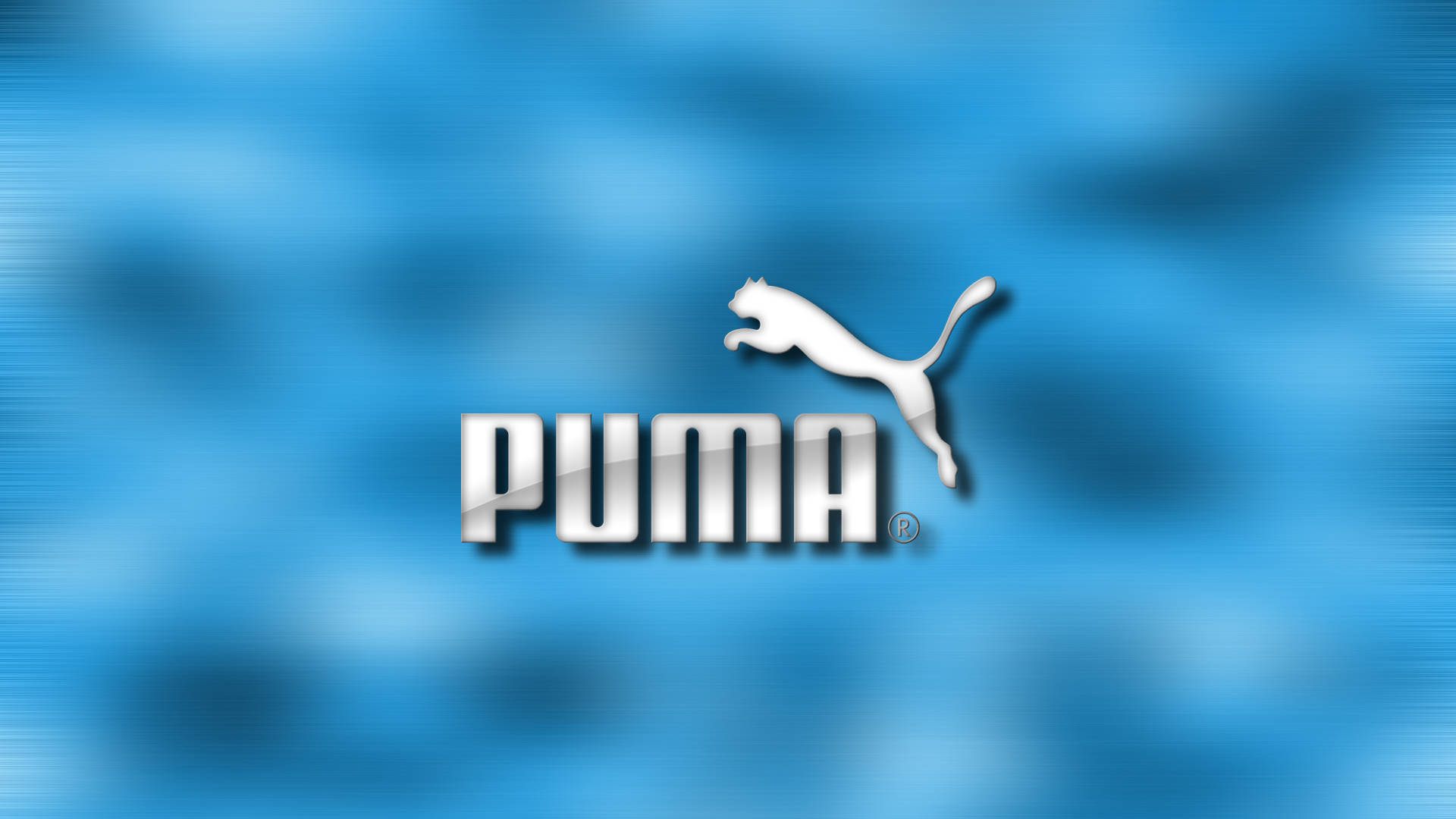 Puma品牌標誌，帶有跳躍的貓在藍色漸變背景上