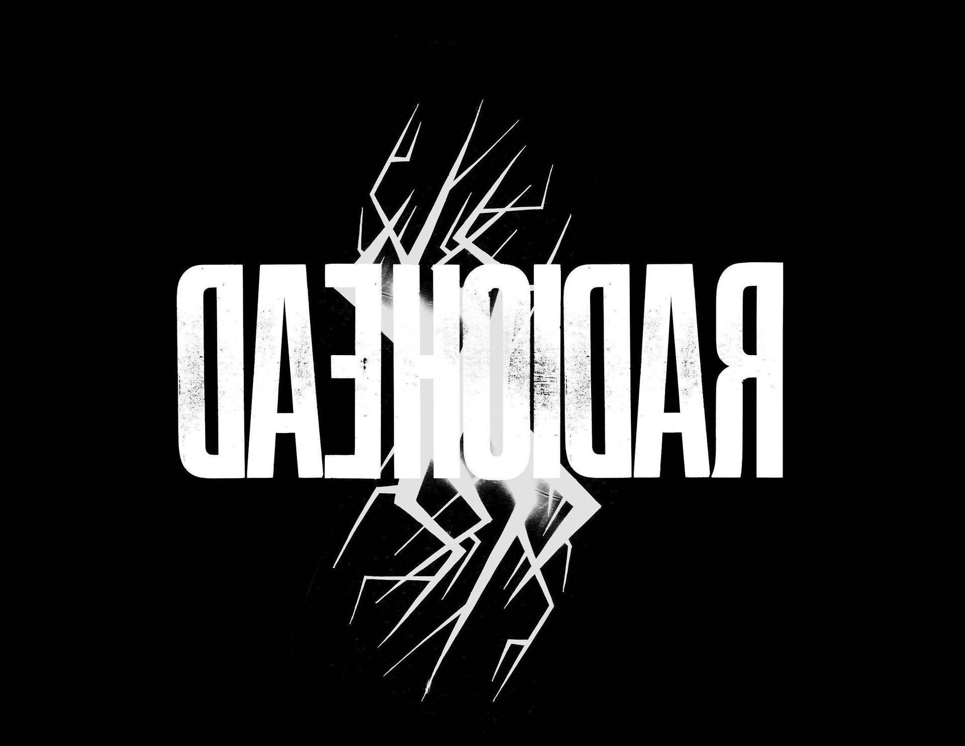Radiohead 樂隊標誌，以粗體白色磨損字體顯示在黑色背景上，帶有抽象線條。