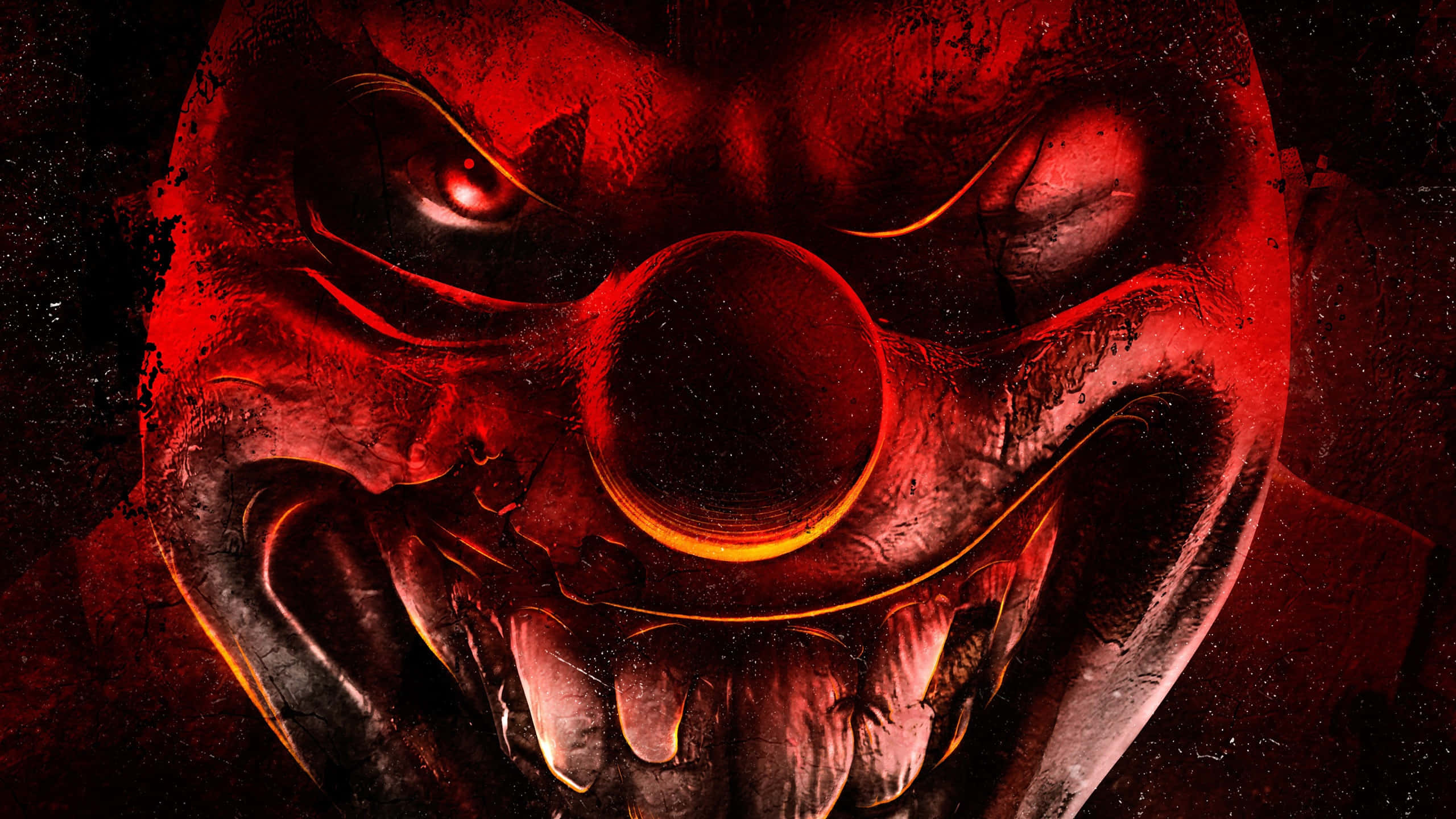 提升您的遊戲體驗，選擇 Red Gaming 壁紙 — 一個可怕的小丑臉孔，有著發光的紅色眼睛和寬闊的笑容，在邪惡的紅色燈光下露出鋒利的牙齒。