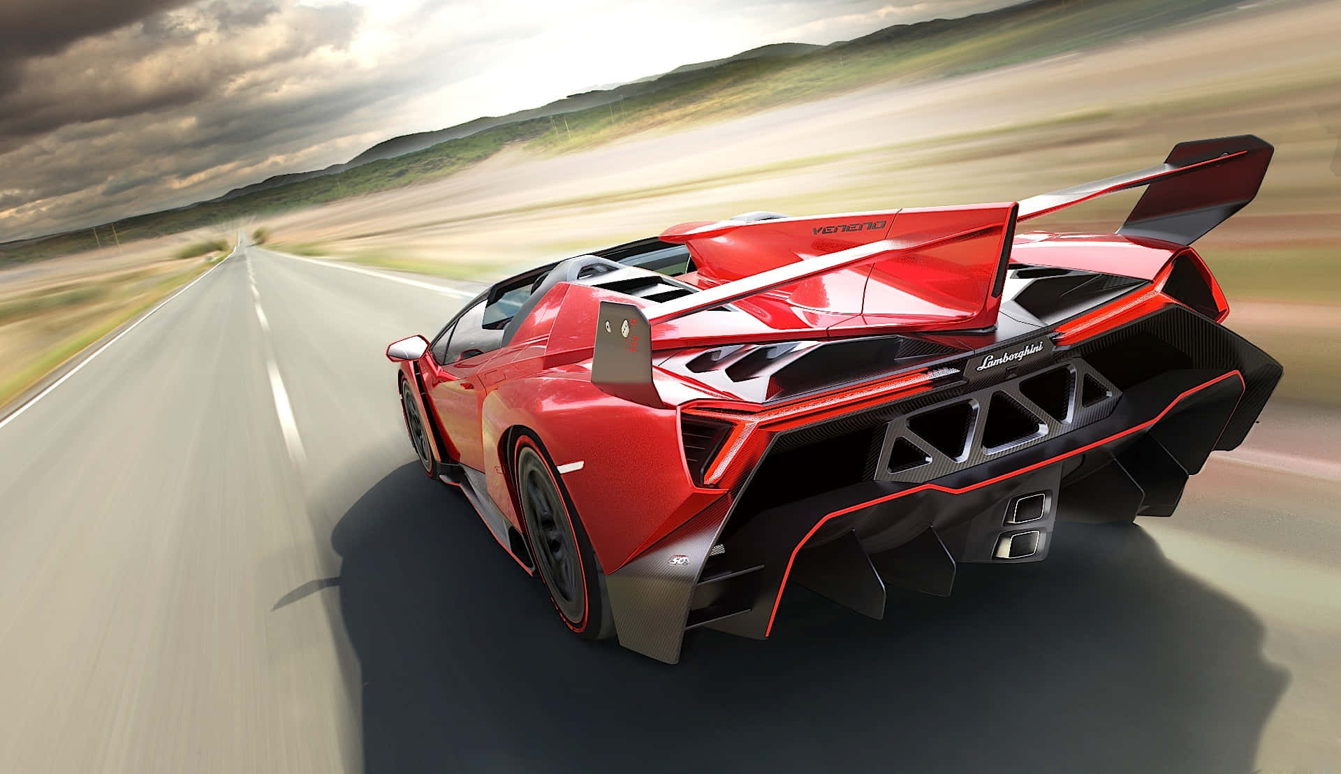 Lamborghini Veneno 桌布 壁紙 — 一輛紅色林寶堅尼 Veneno Roadster 在沙漠公路上疾馳，帶有動態模糊和戲劇性的天空。