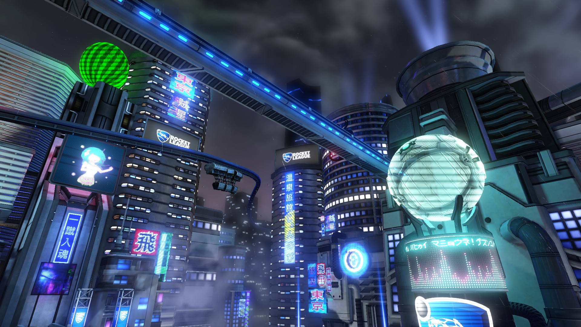 Rocket League未來東京1920x1080 壁紙 — 未來主義的霓虹燈夜景，高聳的摩天大樓在黑暗的天空下閃爍著藍色和綠色的光芒。