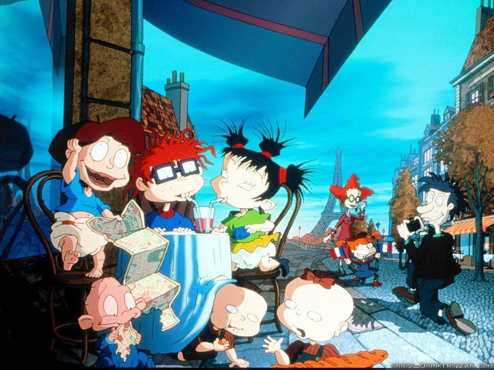 Rugrats 小朋友在巴黎咖啡館，身後是艾菲爾鐵塔。